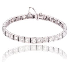 1950er Jahre Platin-Tennisarmband mit 5,10 runden Diamanten im Brillantschliff und Schnörkeln