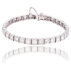 1950's Platinum 5.10 Round Brilliant Cut Diamond Tennis Bracelet with Scrollwork