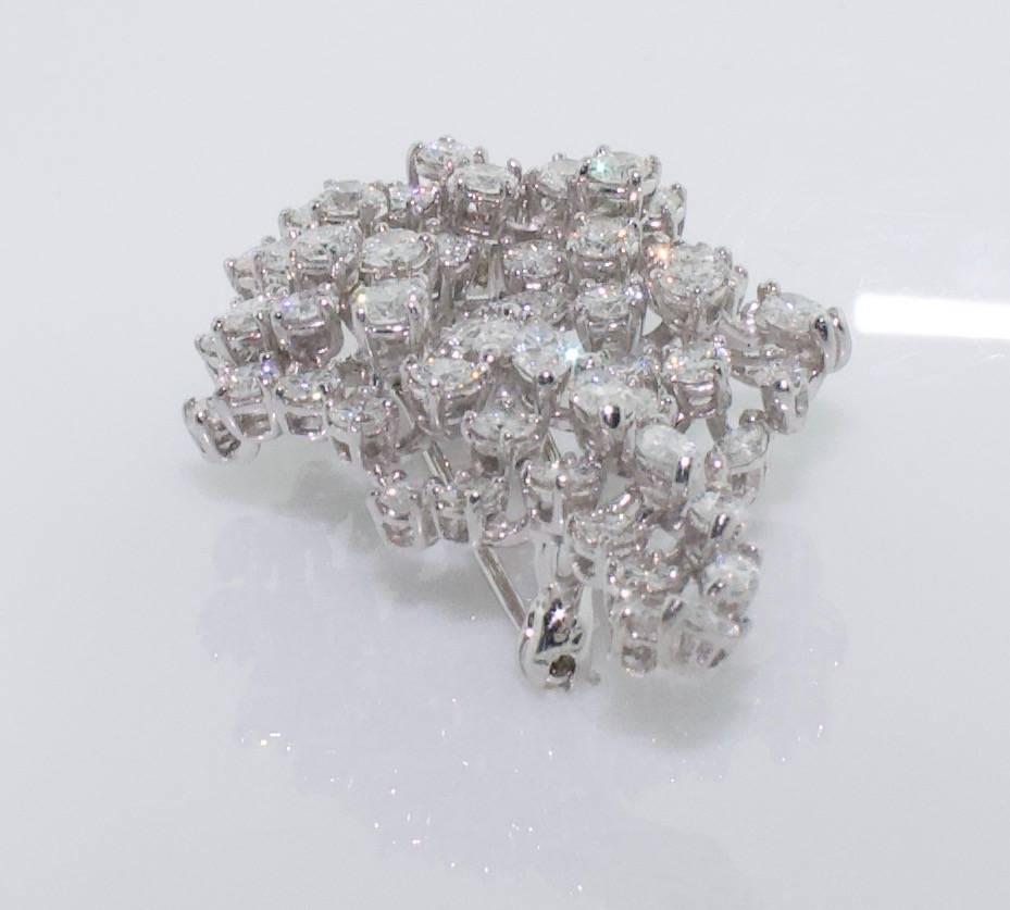 1950's Platinum Diamond Brooch
Handmade and Born in The Fifties the Brooch is a Classic Handmade One of  a Kind Piece The Likes of You Will Never See in The Jewels of Today.  Simply Put The Masters of Design are Long Gone..  Purcahsed From a