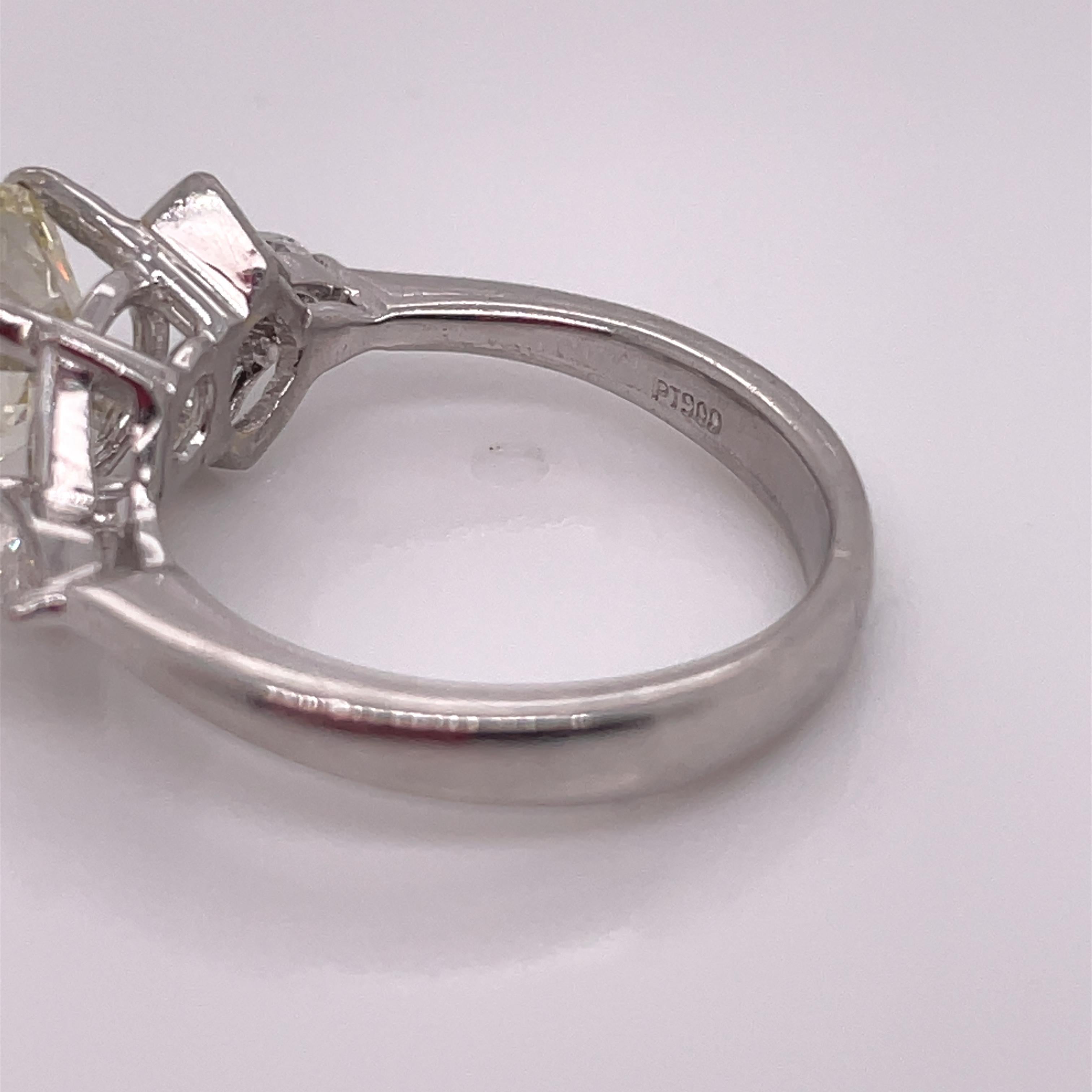 1950's Platinum Diamond Ring with Tapered Baguettes For Sale 4