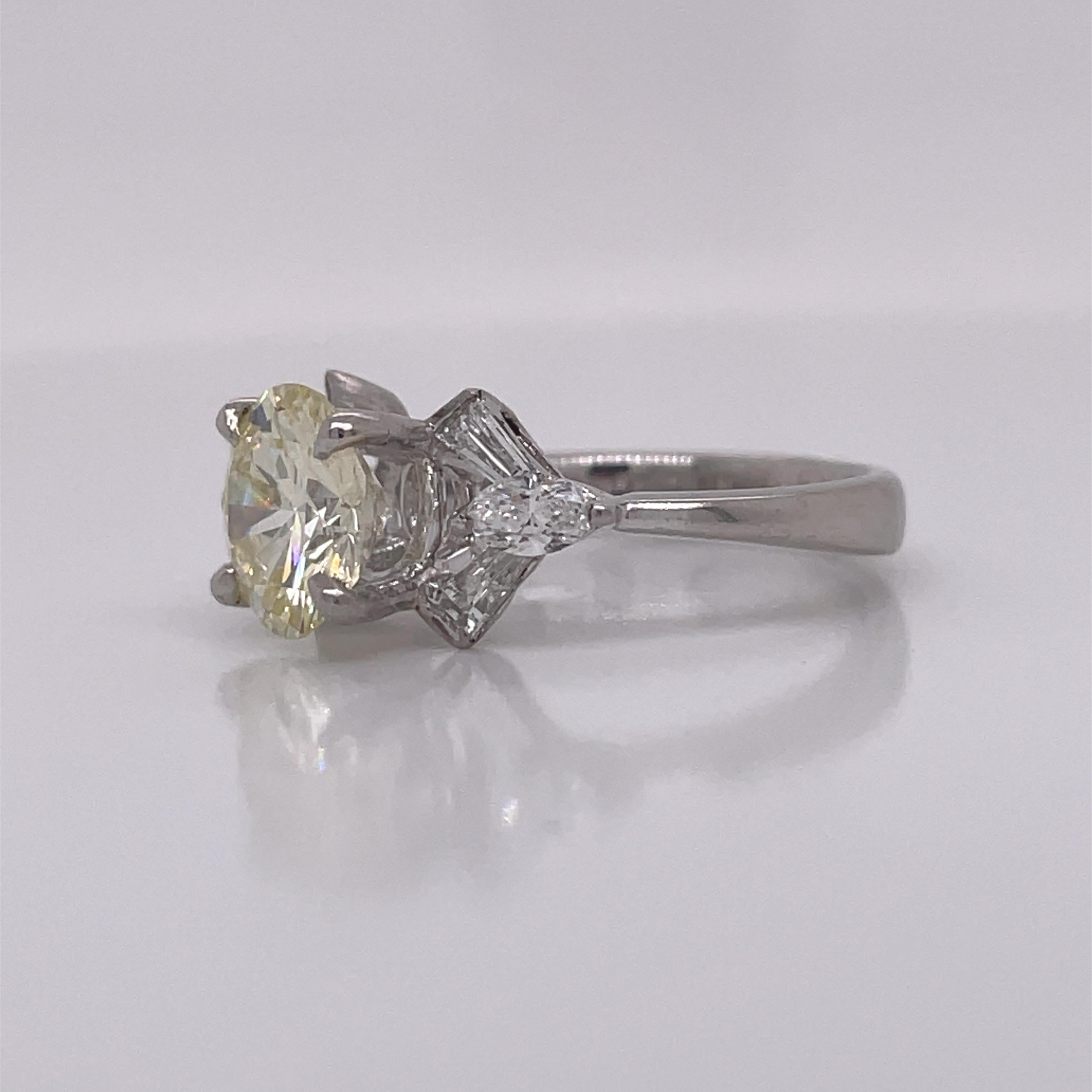 Retro 1950's Platinum Diamond Ring with Tapered Baguettes For Sale