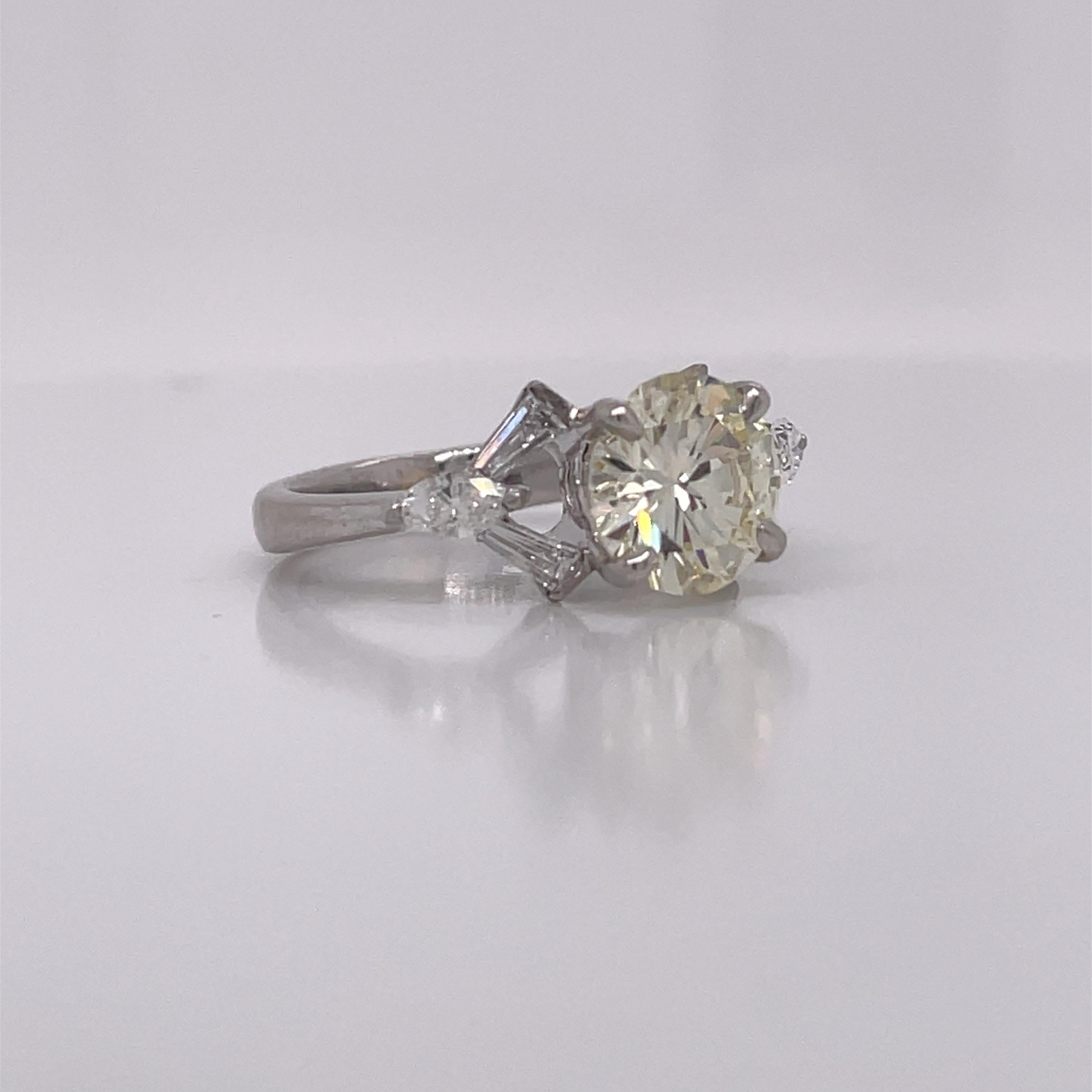 1950's Platinum Diamond Ring with Tapered Baguettes For Sale 1