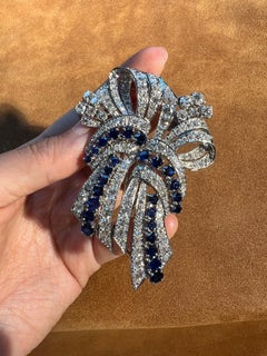 1950s Platinum Sapphire and Diamond Double Clip Bow Brooch