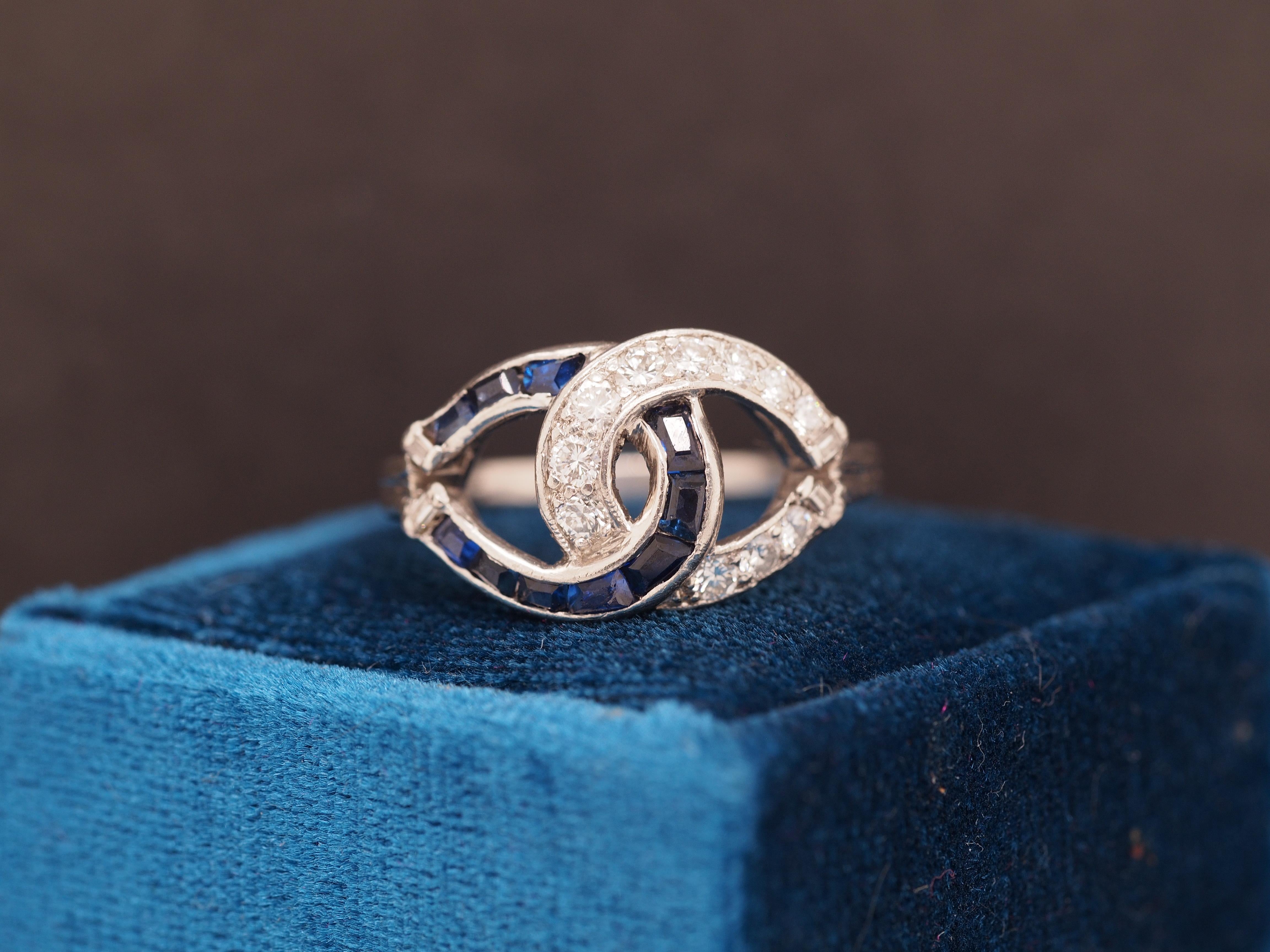 Year: 1950s
Item Details:
Ring Size: 7.25
Metal Type: Platinum [Hallmarked, and Tested]
Weight: 6.1 grams
Diamond Details: .30ct total weight, natural diamonds, E-F Color, VS Clarity, Transitional Round Cut & Straight Baguette Cut
Sapphire Details: