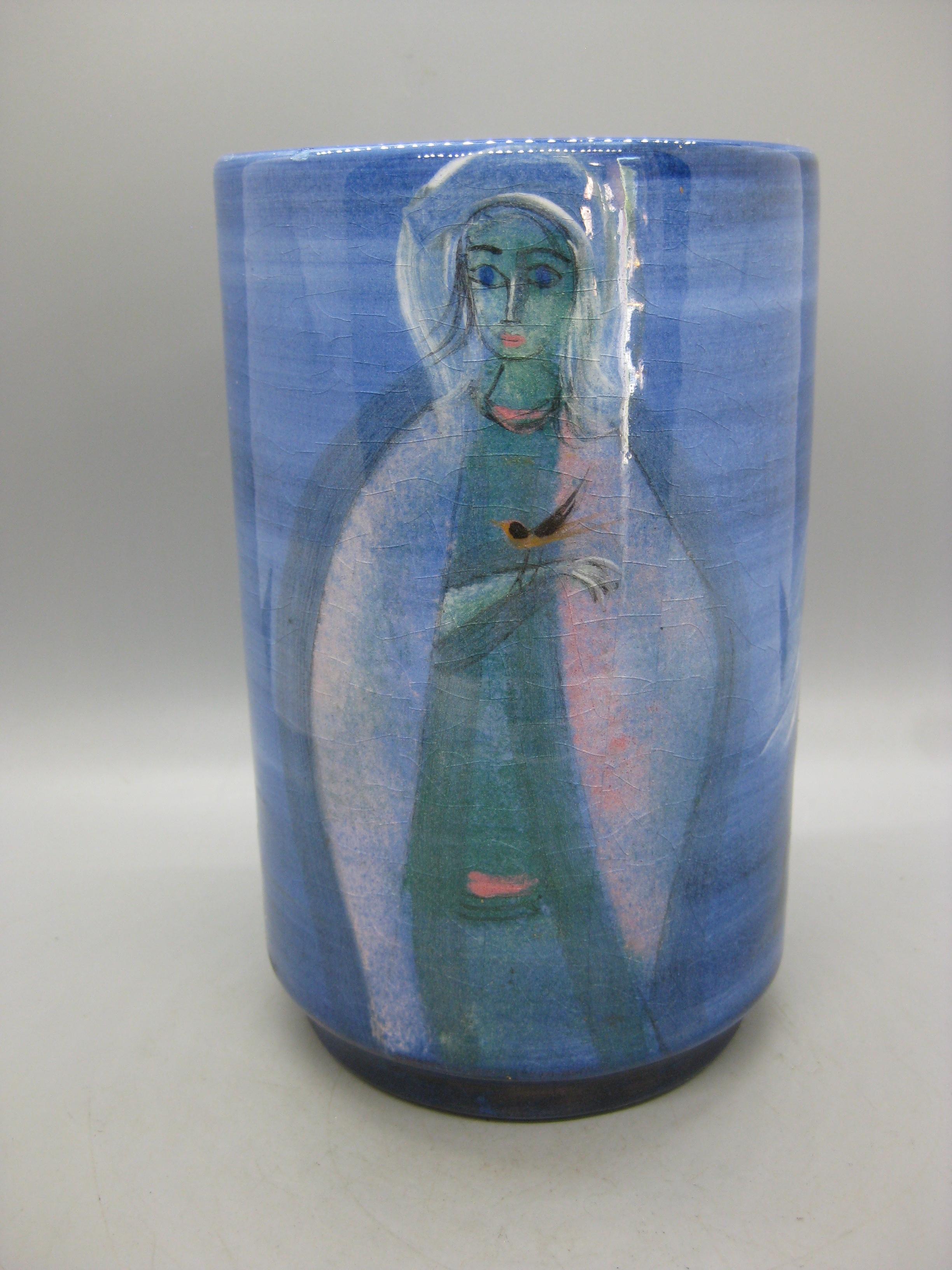 Wonderful Polia Pillin California art pottery vase dating from  the 1950's. Features two hand painted images of a woman holding a bird and then a horse. Signed on the bottom. In very nice original condition. Color is great and displays well. There