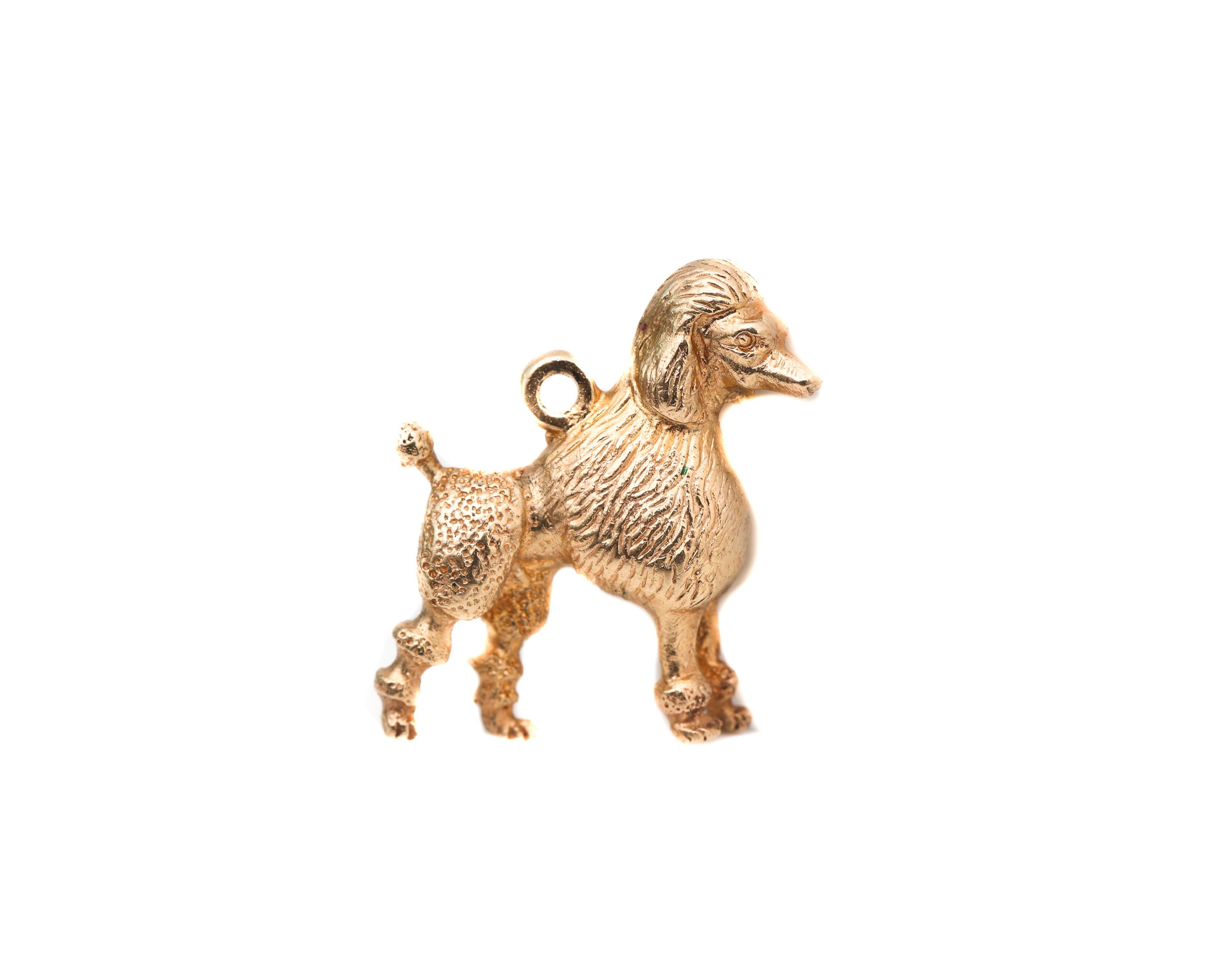 Adorable standing Poodle Charm
Crafted in 14 karat yellow gold with heavy textured details

Charm Details:
Gold: 14 karat yellow gold
Weight: 4.09 grams
Size: 15 millimeters height x 10 millimeters wide 