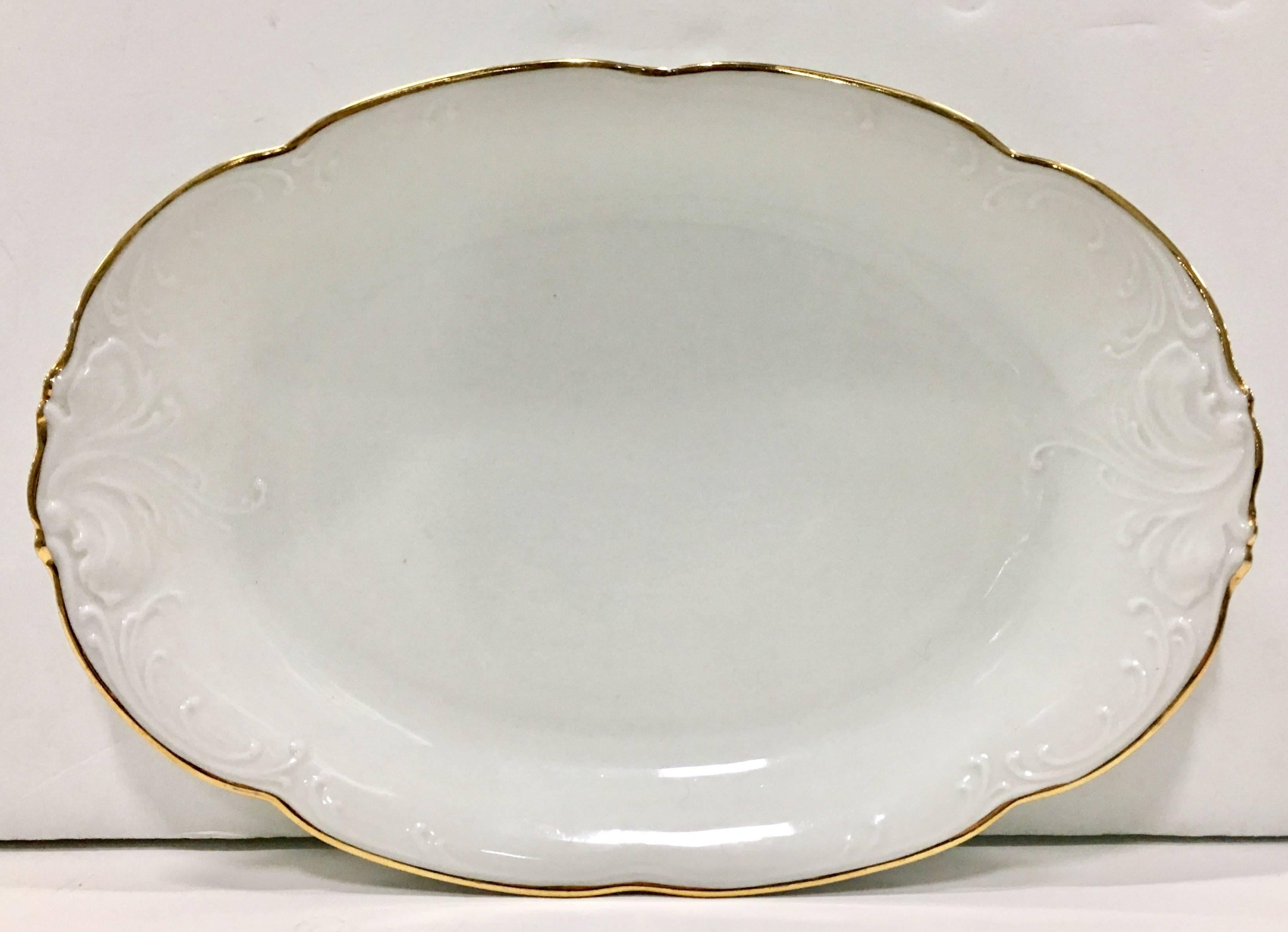 1950s fine porcelain & 22-karat gold dinnerware set of twenty one pieces, 