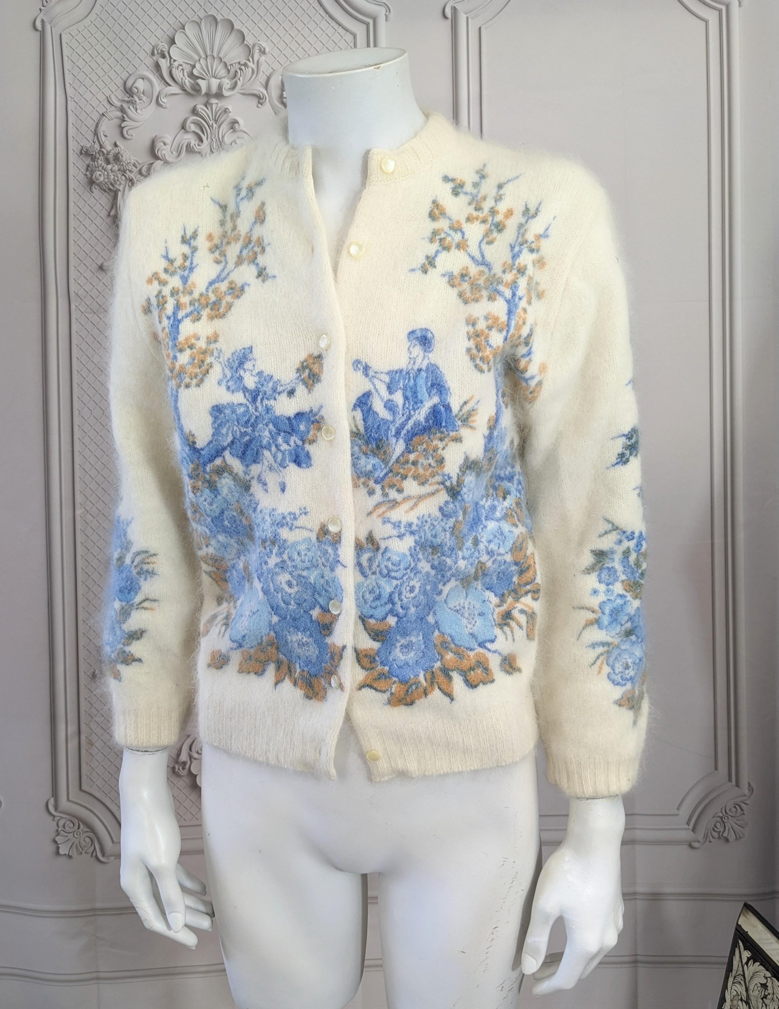 Charming 1950's Printed Angora Cardigan with 18th Century Courtesan scenes. Lambswool and angora rabbit blend with faux mother of pearl buttons. Size Small. 1950's USA. 