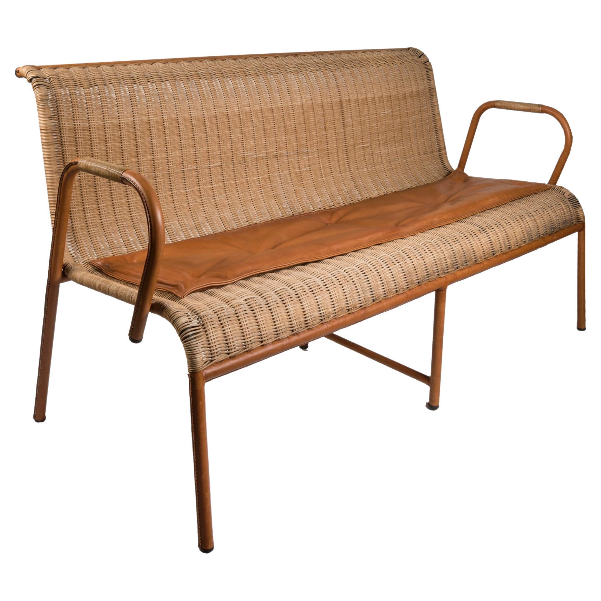 1950's Rattan and Stitched Leather Sofa by Jacques Adnet For Sale
