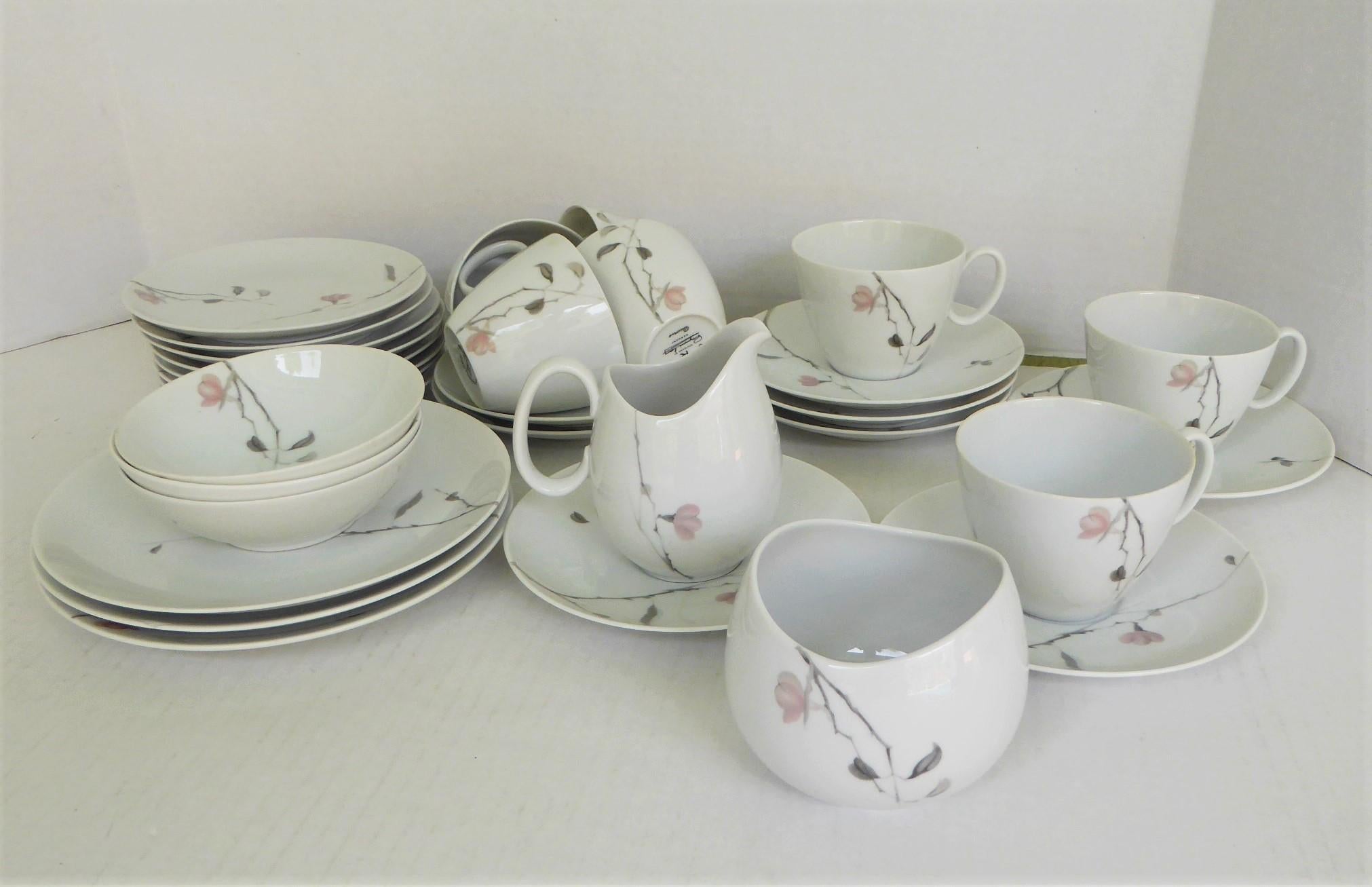 A 1950s Continental China porcelain coffee breakfast service of 36 pieces from Rosenthal, the German porcelain maker. Designed by Raymond Loewy and in production from 1956 through 1964. Mid-Century Modern depiction of flowering Quince tree branches