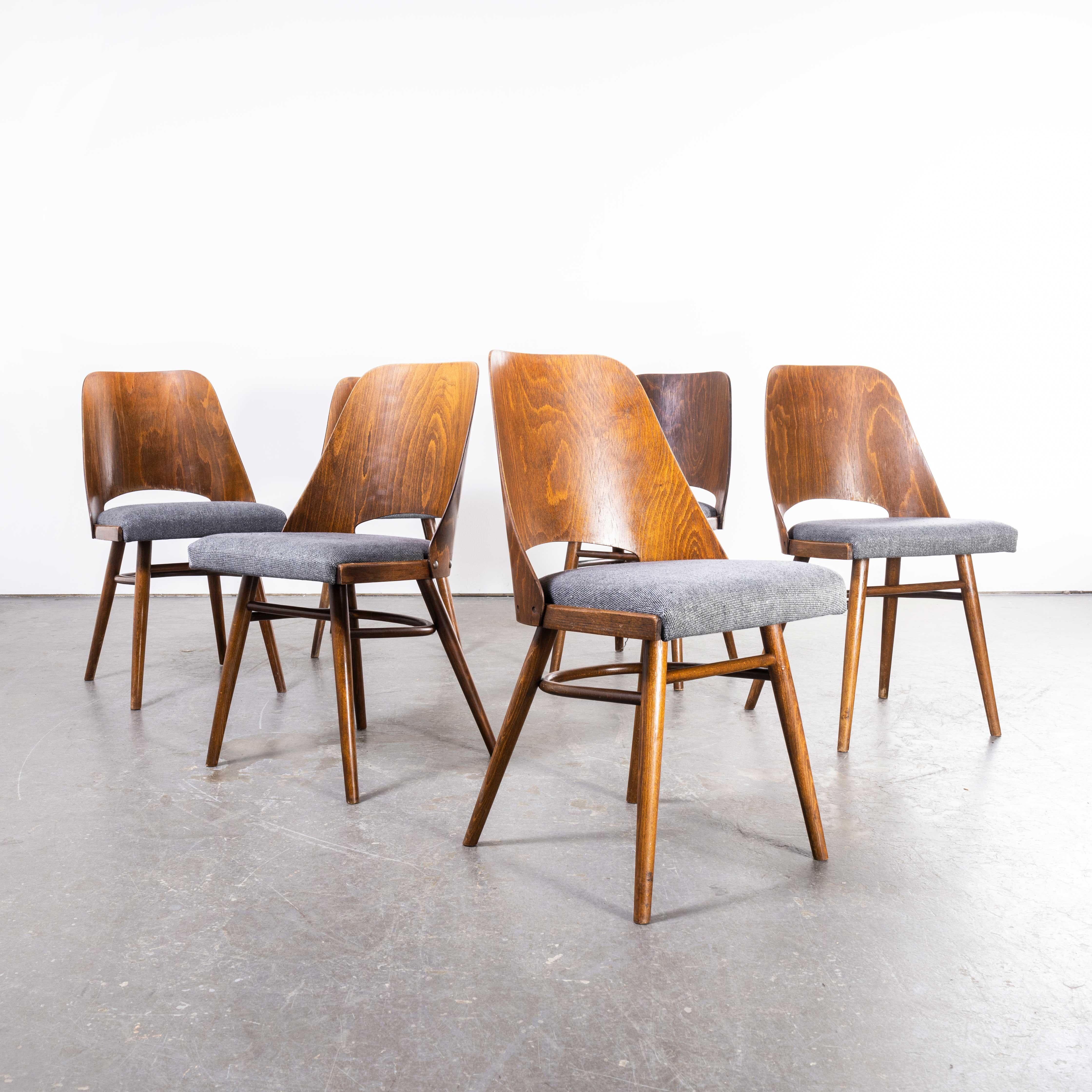 1950’s re -upholstered Thon dark walnut dining chairs by Radomir Hoffman – Set Of Six (1881)
1950’s re -upholstered Thon dark walnut dining chairs by Radomir Hoffman – Set Of Six (1881). These chairs were produced by the famous Czech firm Ton,