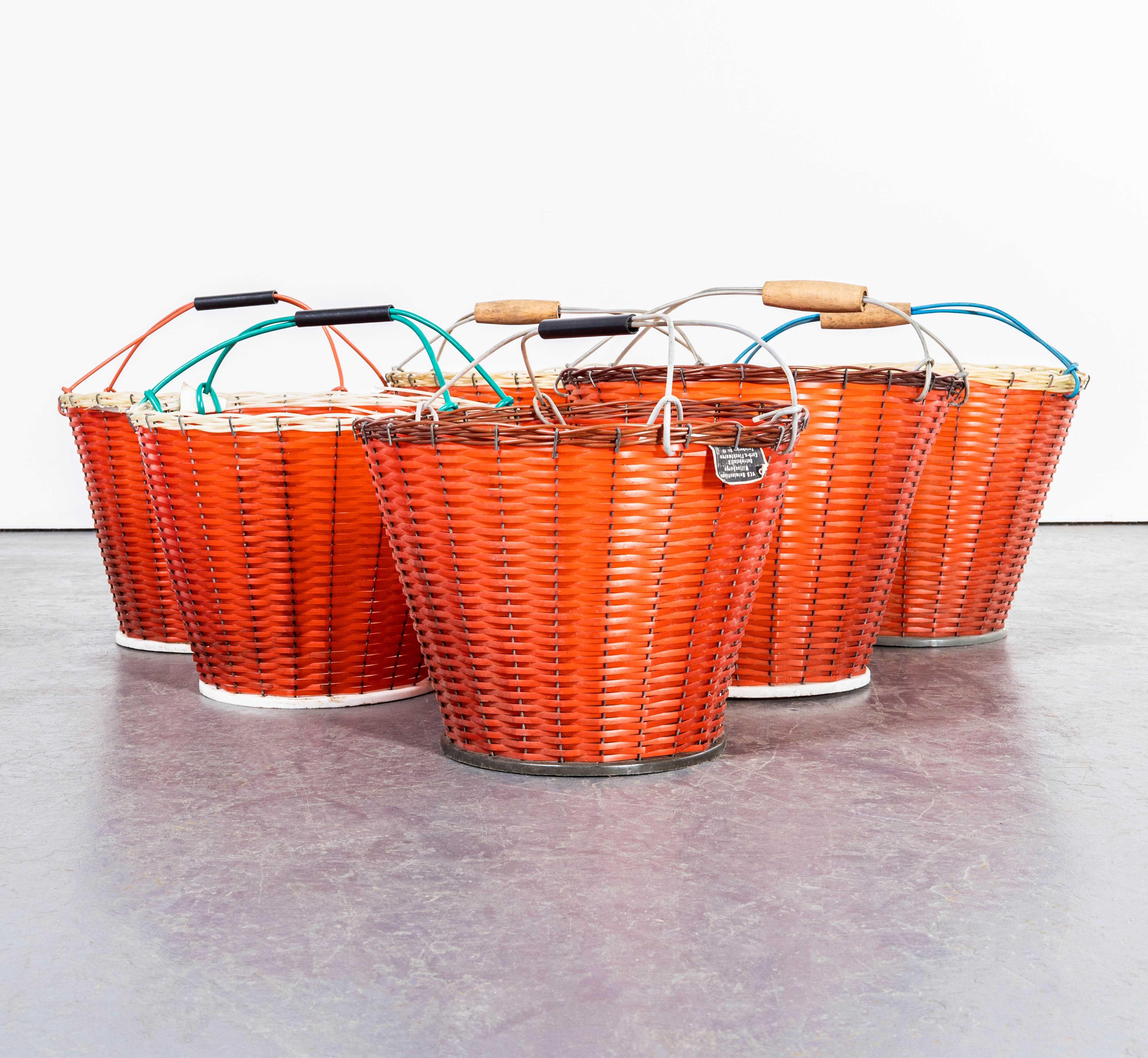 1950's Red Grape Picking Baskets - New Old Stock GDR. 

Stunning original new old stock grape picking baskets from the GDR, better known as post war Eastern Europe. Most have original GDR labels. Hand woven in the 1950's with plastic weave. One of