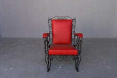 Fauteuils en fer forgé recouverts de Skaï rouge des années 1950