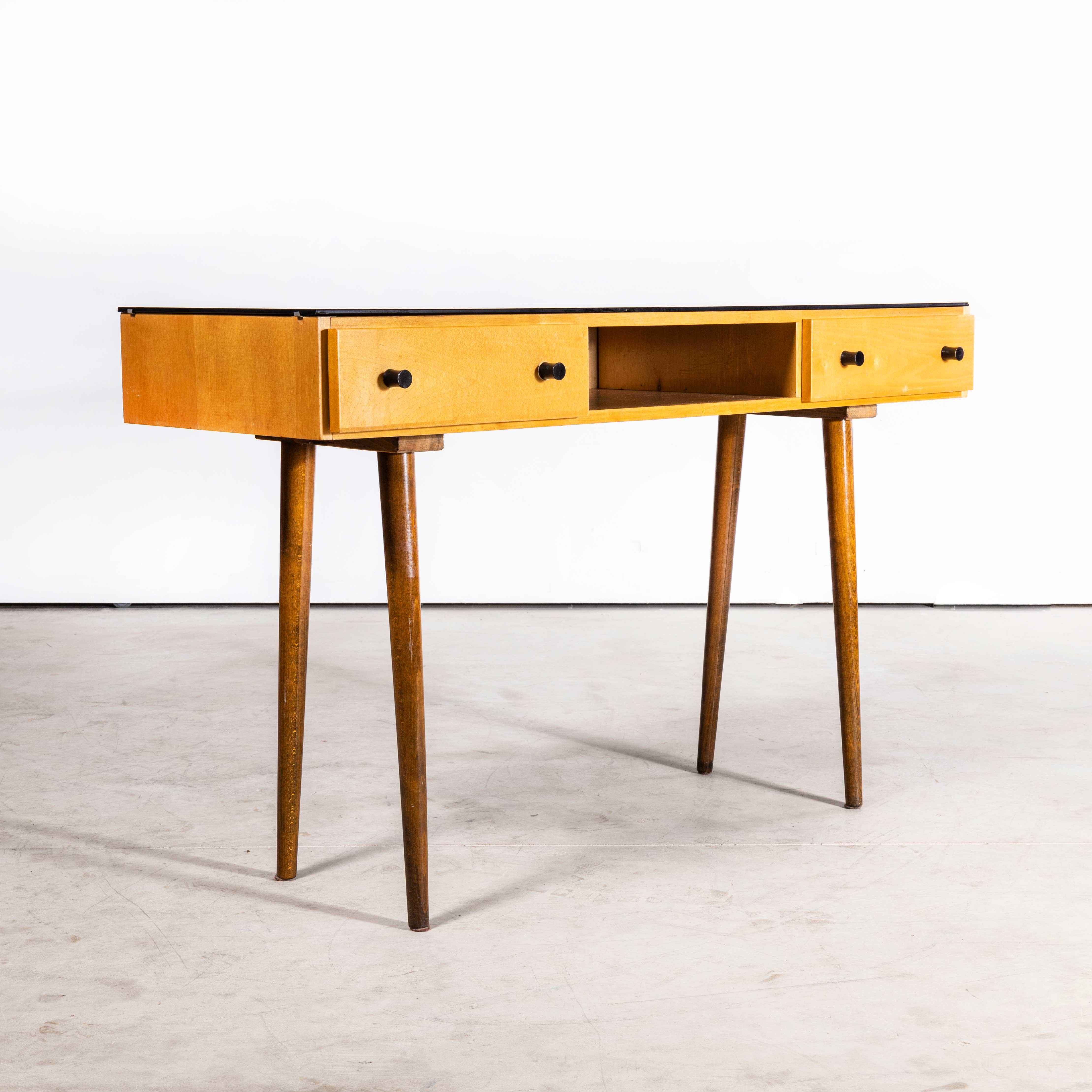 1950s Refined Rectangular Dressing Table – Small Desk
1950s Refined Rectangular Dressing Table – Small Desk. Beautiful simple and Classic mid-century side table sourced in the Czech Republic. Czech design will always be affiliated to the Bauhaus