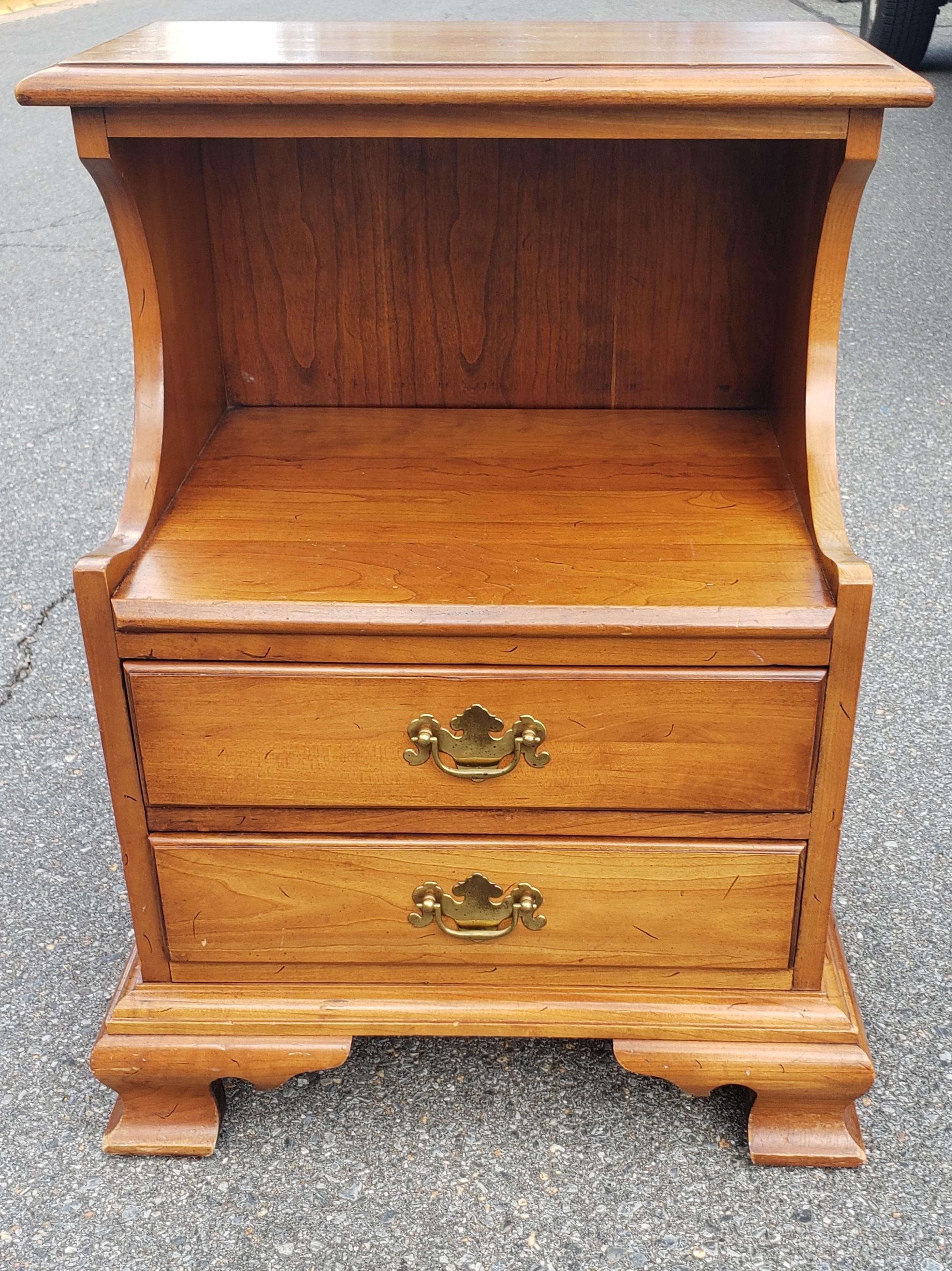 A midcentury Refinished Chippendale tiered 2-Drawer Light Wild Cherry Nightstand 
 This is part of a set with a double bed, a 9-drawer chest of drawers and a Double dresser.