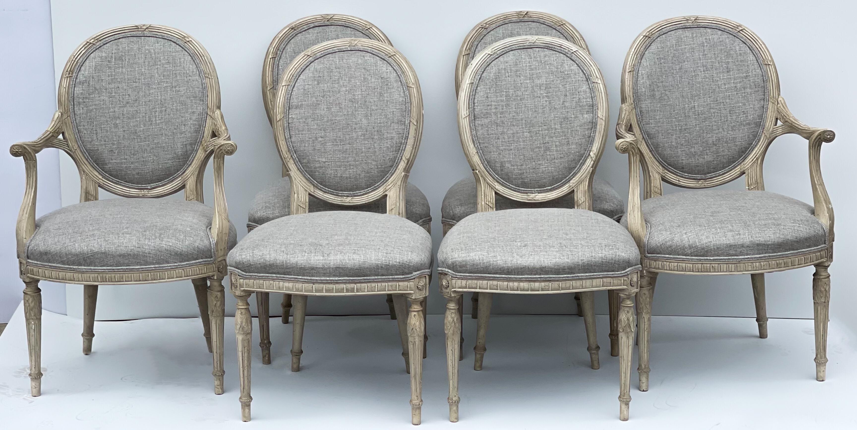 This is a lovely set of six regency style carved dining chairs by Beacon Hill. The carved frames have wonderful detail. The upholstery is a new neutral linen. The finish is original. 
Side chairs: L 21.5” x 22” W x 36” H. Seat: 19”.