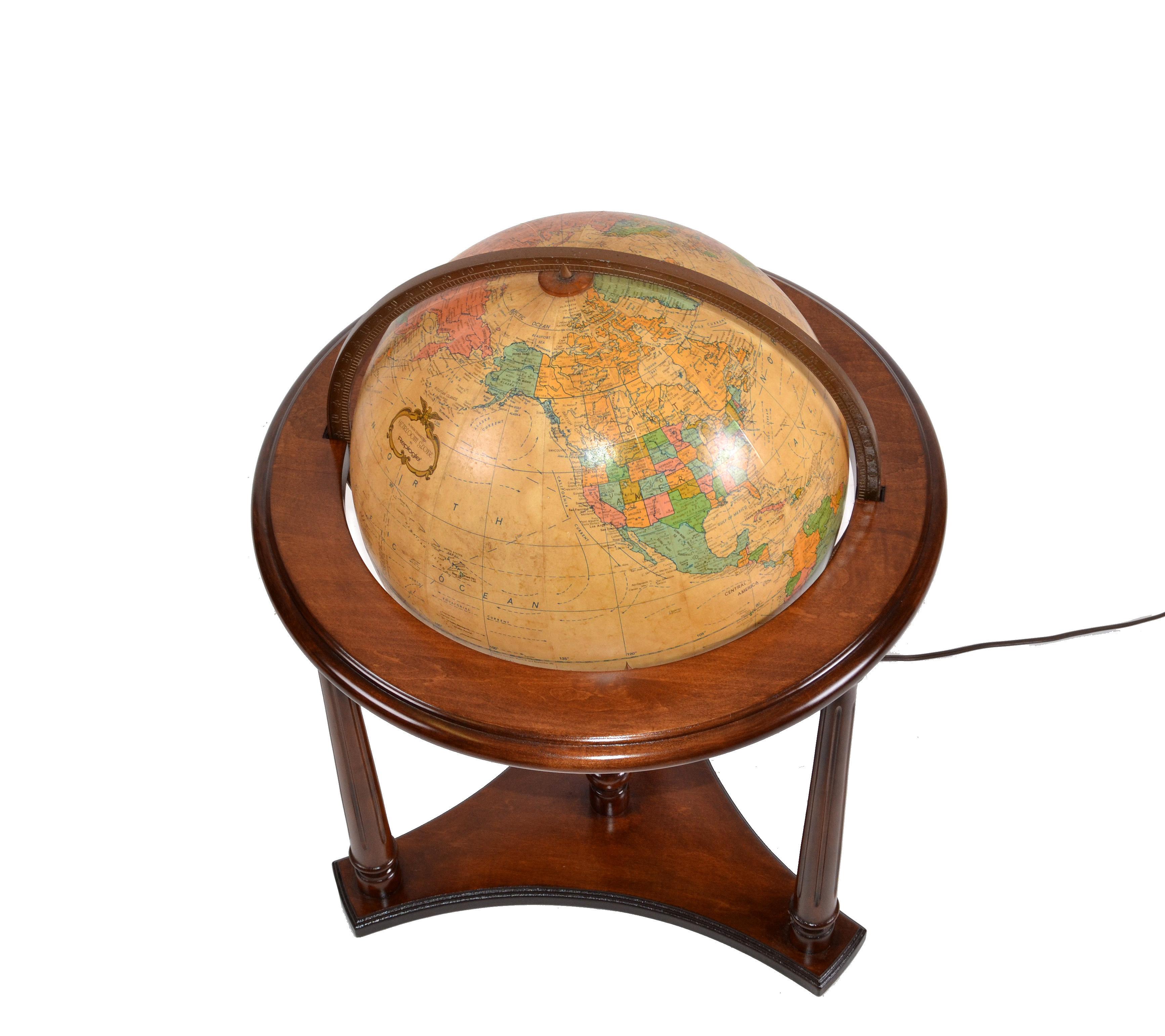 Restored 1960s Replogle Illuminated glass globe on a dark brown walnut stand.
Globe features a Parchment paper map over glass and has a full 360 degree turning function.
Is in perfect working condition and has a switch in between the cord.
Marked