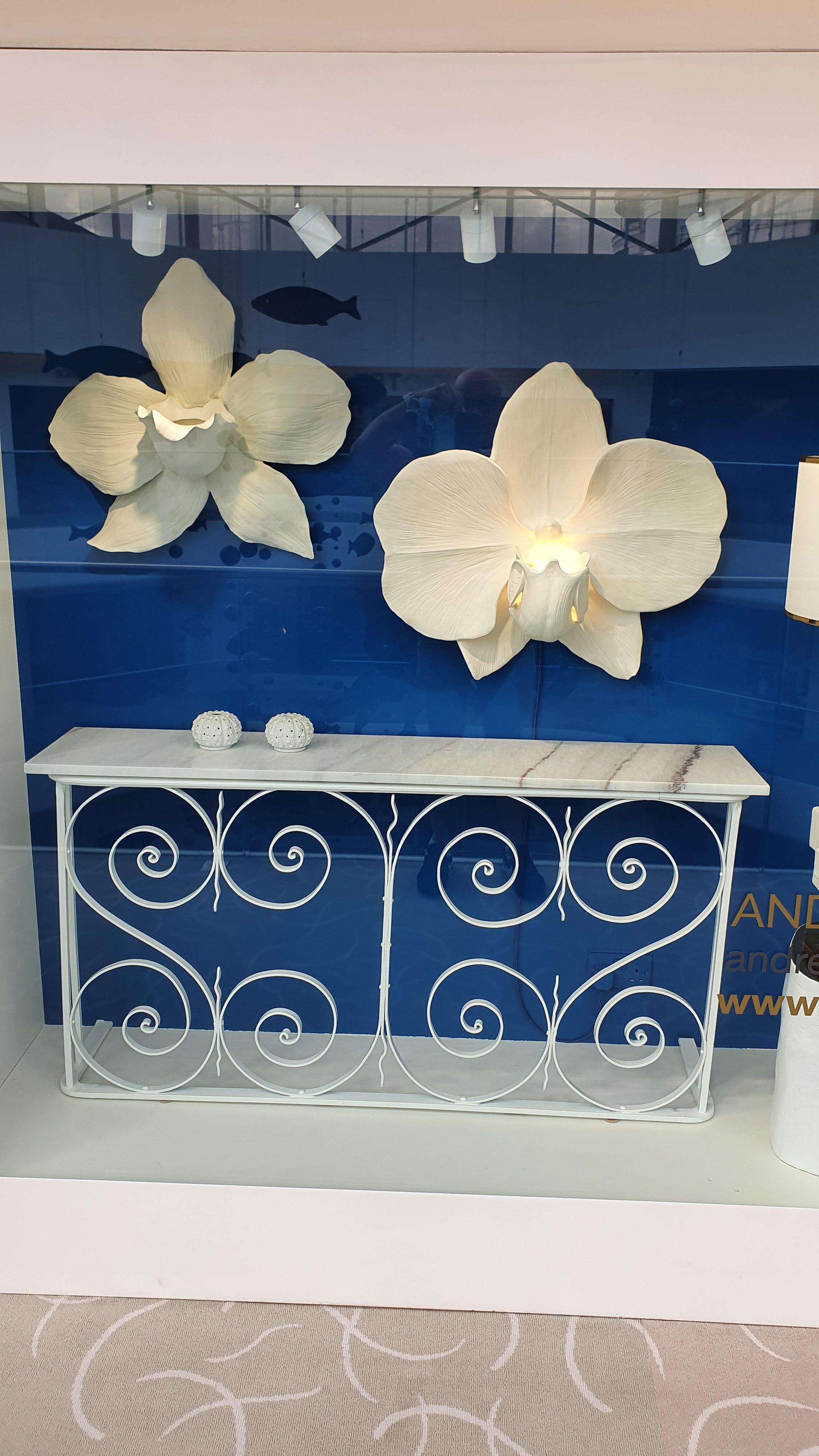 This stunning Console Table was made by Andrew from an Original 1950's wrought iron balcony rail that has had its fixing forks carefully cut off to make it smooth ended and perfect to fit against a wall. 

Andrew found this in an architectural