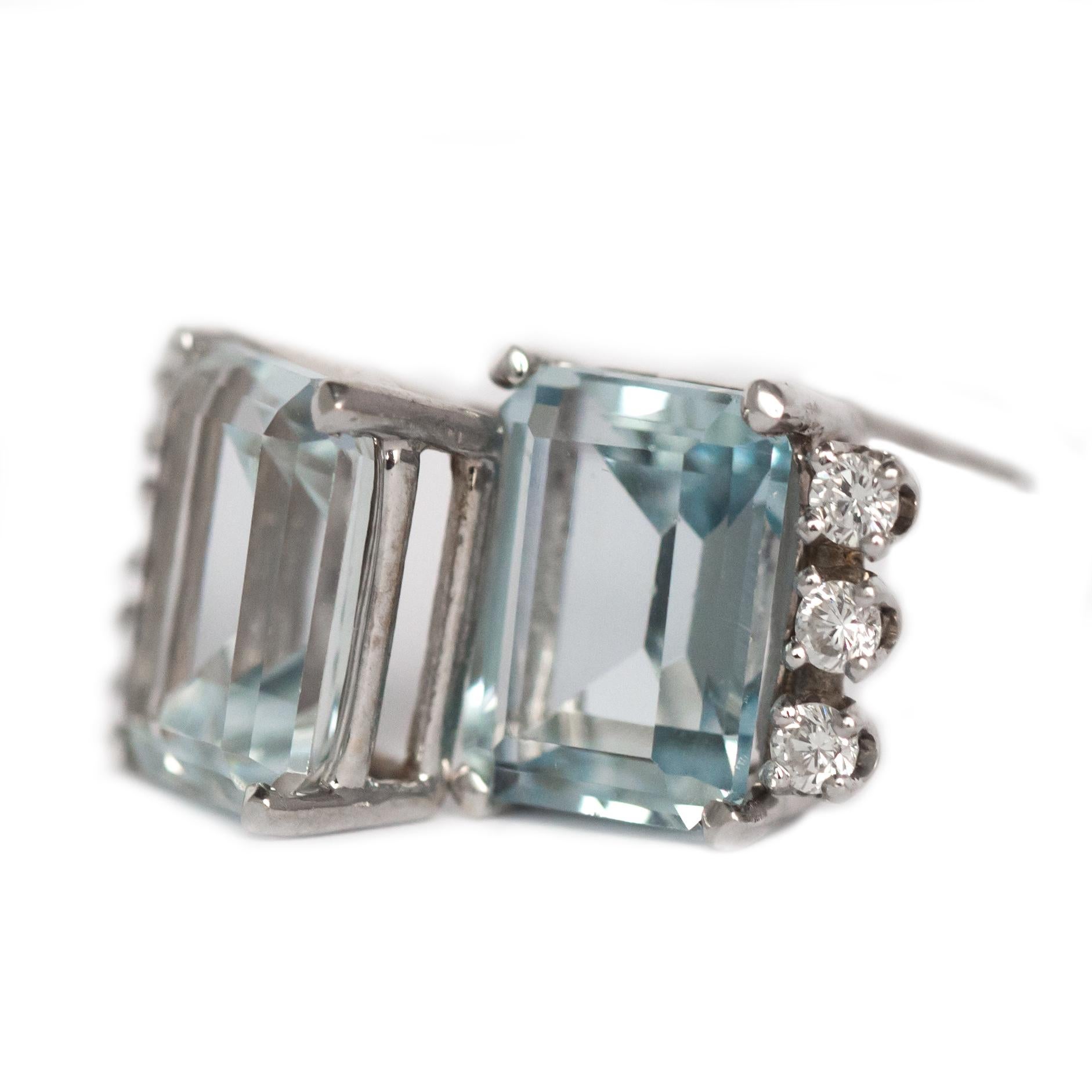 Item Details: 
Metal Type: 14K White Gold
Weight: 2.2 grams (total)

Color Stone Details: 
Type: Aquamarine, natural
Carat Weight: 6 carat, total weight.
Color: Light Blue

Side Stone Details: 
Shape: Single Cut
Total Carat Weight: .12 carat, total