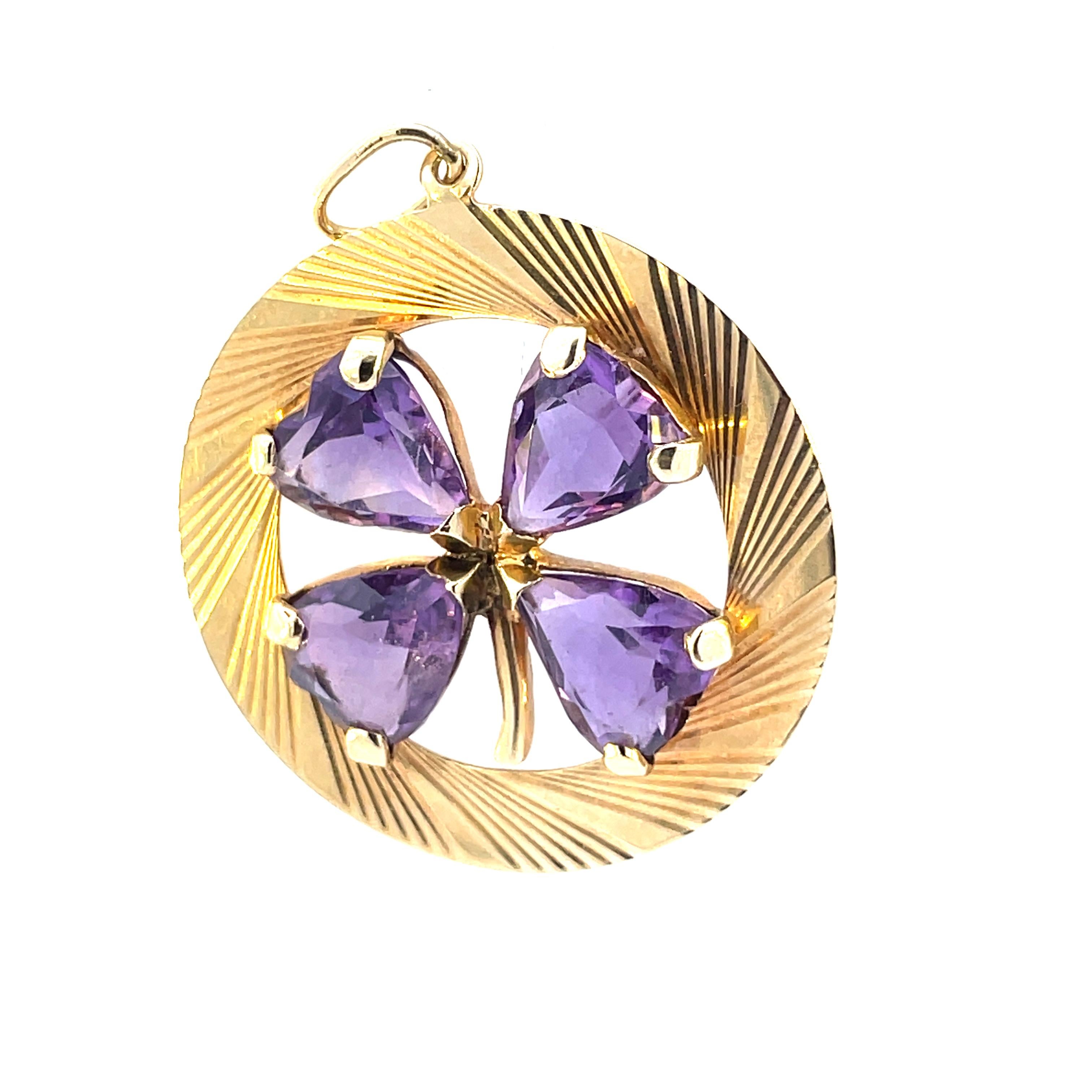 1950s Retro 14k Yellow Gold and Amethyst Clover Pendant 
- 14K Yellow Gold 
- 4 = 9.00x5.75mm heart amethyst 
- 8.26 grams 
- 1950s 

This is a stunning retro clover pendant from the 1950s made in 14k yellow gold with heart amethyst. The centerpiece