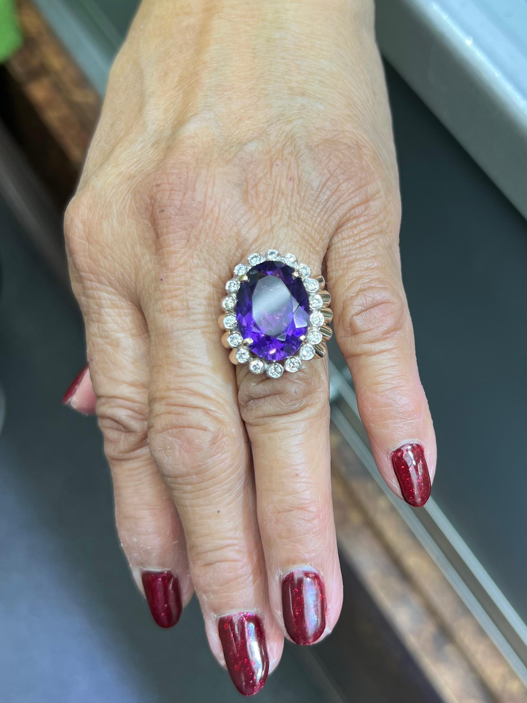 1950s Retro Amethyst and Diamond 14k yellow gold cocktail ring.

The 1950s Retro Amethyst and Diamond 14K Yellow Gold Cocktail Ring exemplifies the distinctive aesthetic and craftsmanship characteristic of mid-20th century jewelry design. This era