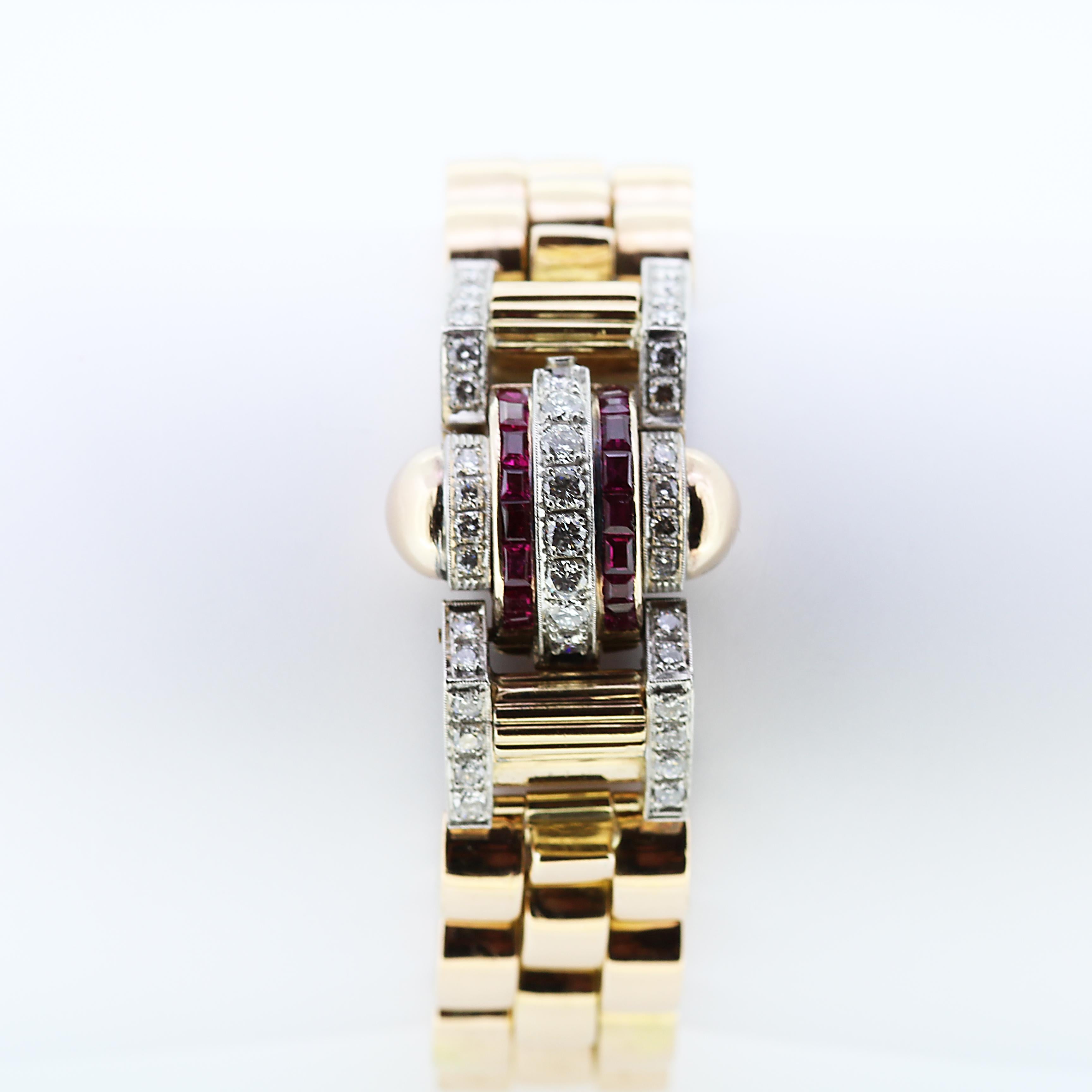 Rose gold ruby and diamond dome bracelet with swirls details engraved on the side. Details clasp with rectangular cut rubies and 40 round brilliant cut diamonds with estimated total weight 1.3 cts. 
Clasp width 2.2 cm
Bracelet width 1.58 cm