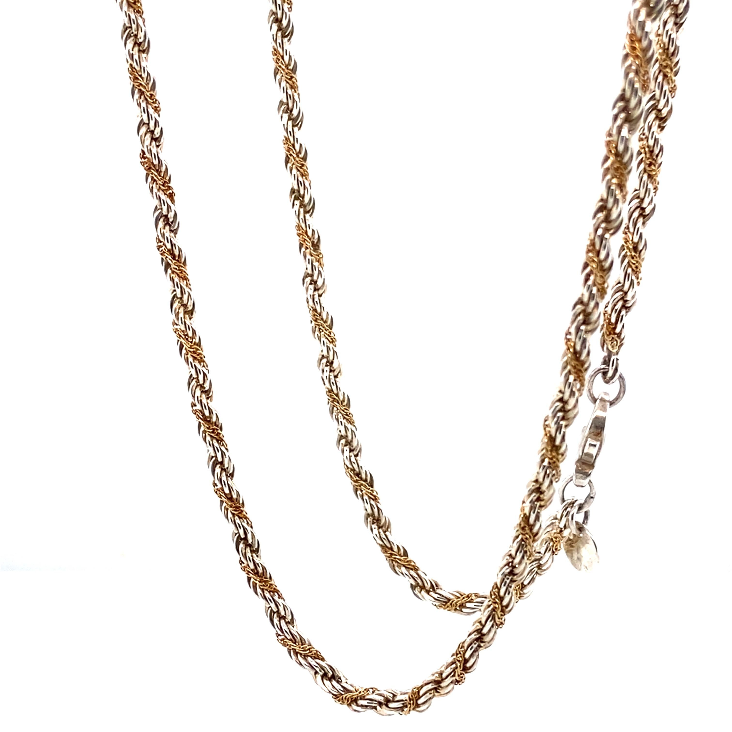 Item Details: 
Metal: Sterling Silver and 18 karat yellow gold 
Weight: 15.3 grams 
Measurements: 18 inches long 

Item Features: 
This stunning Tiffany & Company Rope Chain intertwines with a beautiful mix of 18 karat yellow gold and sterling