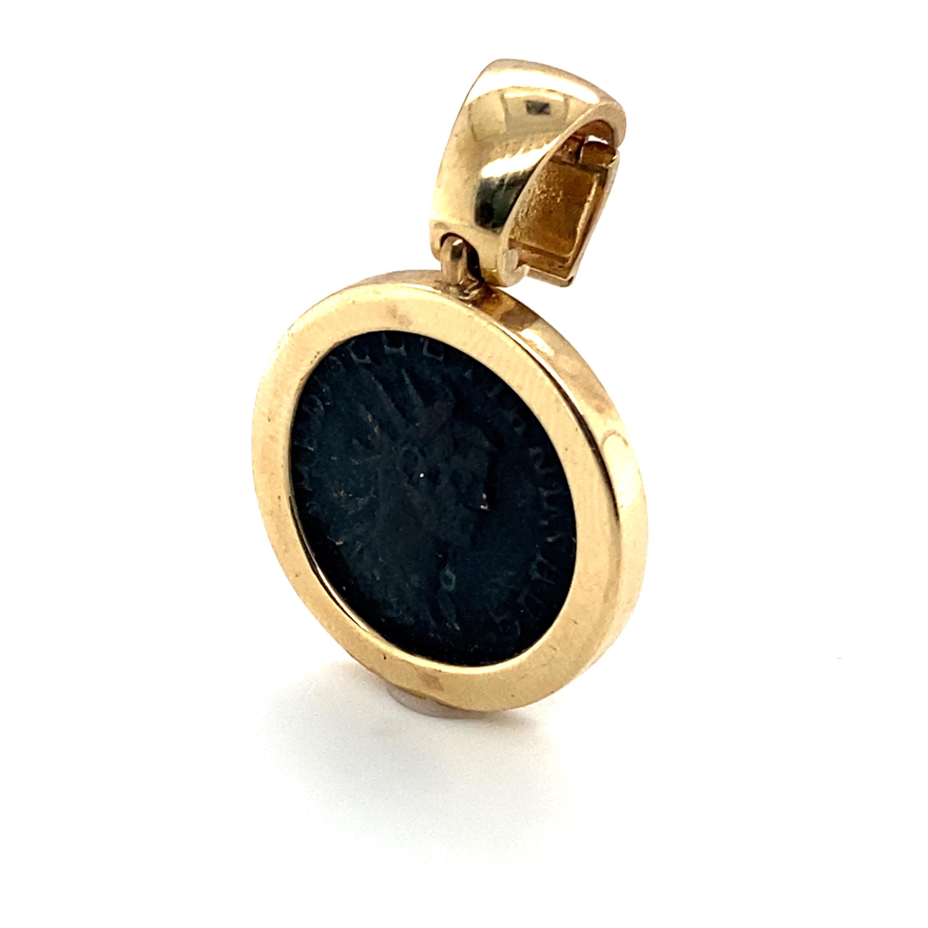 Item Details: 
Metal: 14 Karat Yellow Gold 
Weight: 7.3 grams 
Measurements: 1 inch x 1 inch 
Hallmark: 14 Karat Italy (under the clasp)

Item Features: 
This beautiful classic roman pendant has an antique coin that has a stunning bronzed look. This