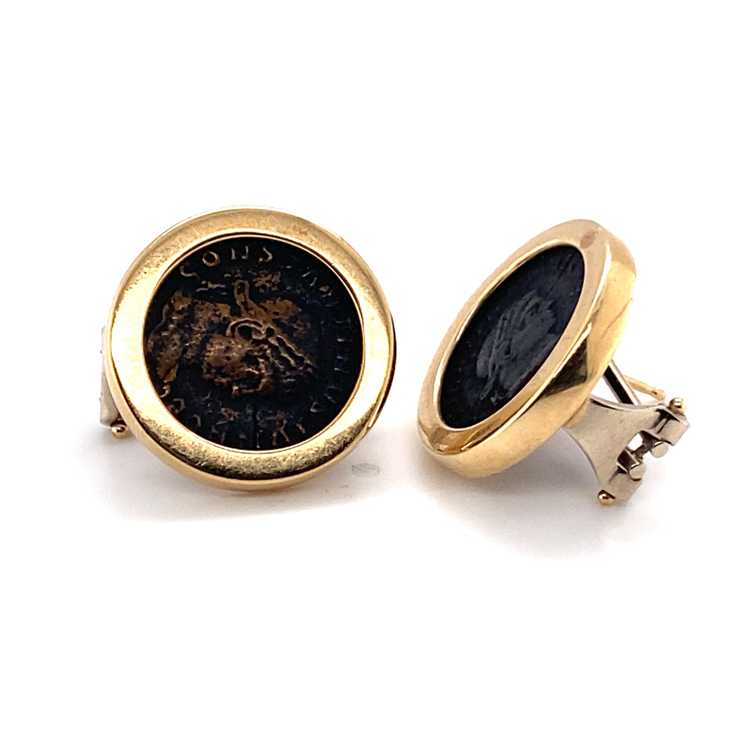 Item Details: 
Metal: 14 Karat Yellow Gold 
Weight: 12.4 grams
Measurements: .75 inches x .75 inches 
Hallmark: 14 Karat Italy

Item Features: 
These beautiful classic roman earrings have an antique coin look that are most likely to be bronzed.