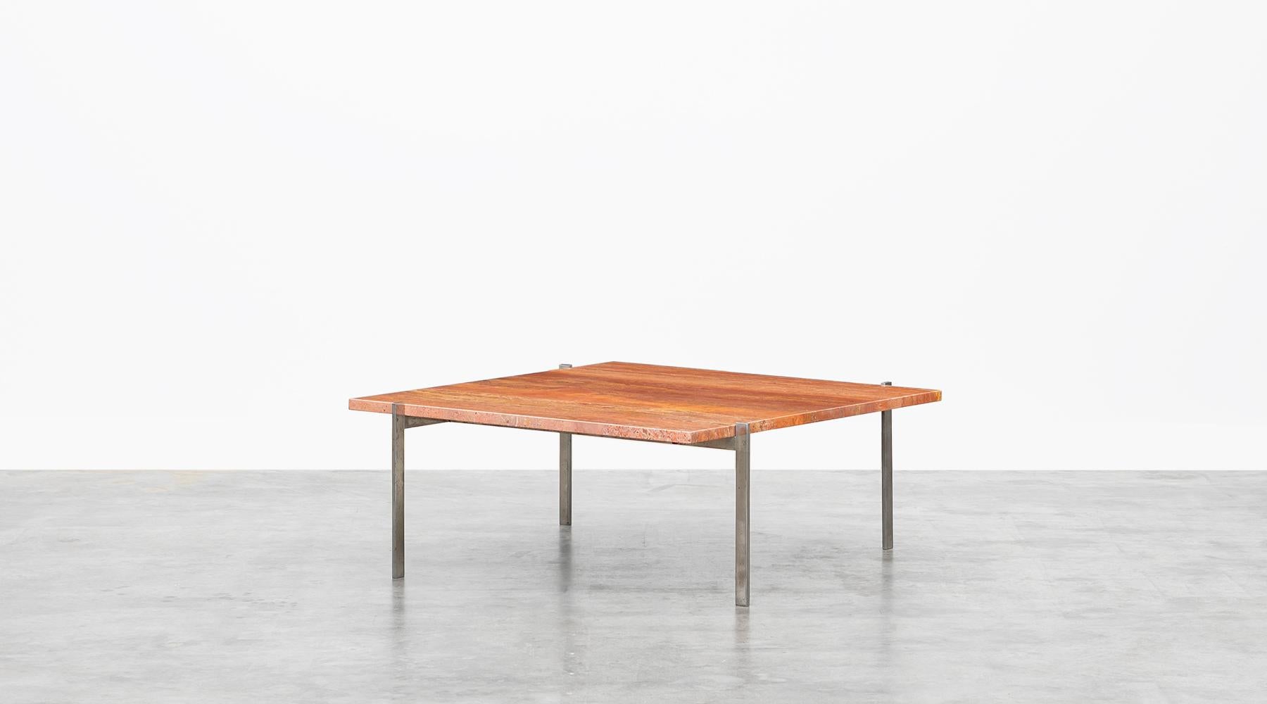 Fantastic square coffee table designed by Danish Poul Kjaerholm in 1956. This table has a brushed matte chrome-plated steel frame and comes with a very nice rose-colored marble top that is in good condition with minimal wear due to use and age. Very