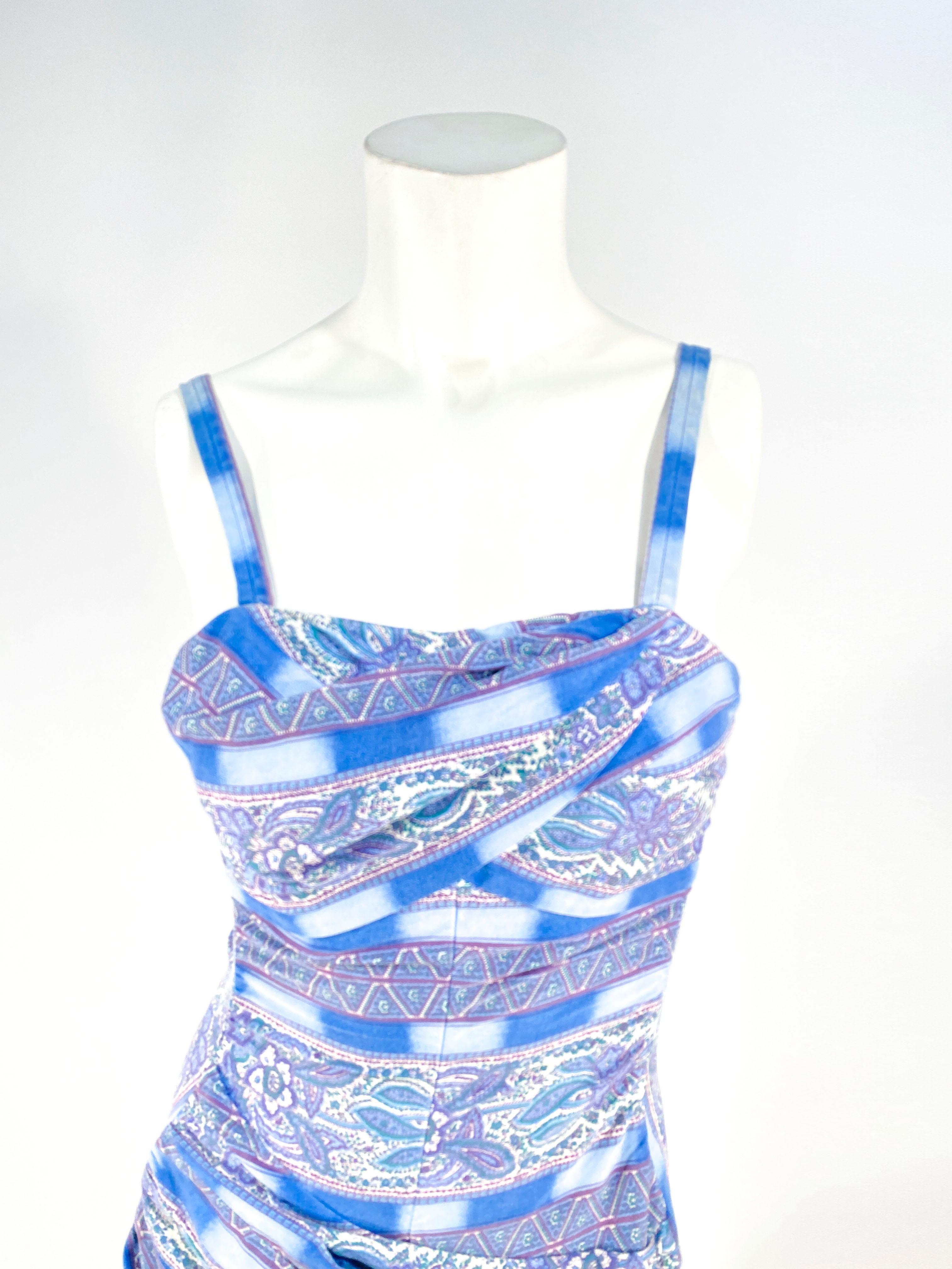 1950s Rose Marie multi-toned blue paisley & stripe printed bathing suit with a surang wrapped bodice and hip. The bodice and rib area has structured boning for support. The straps are adjustable to accommodate a more comfortable fit and the back has