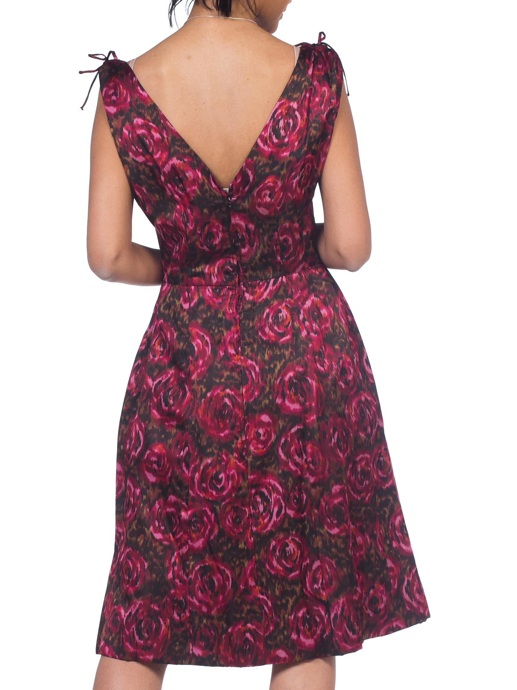 Gorgeous artisian woven fabric is the star of this dress however there is some wear to the shoulders but the print disguises it. Fully lined in rayon 1950S Cranberry Red & Black Silk Satin Floral Ikat Cocktail Dress 