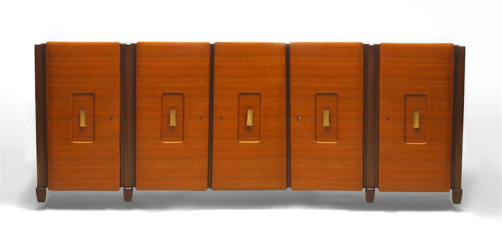 Italian Mid-Century (1950s) rosewood sideboard with 5 teak doors having a rectangular brass handle and supported on low tapered square legs (Attributed to OSVALDO BORSANI)
