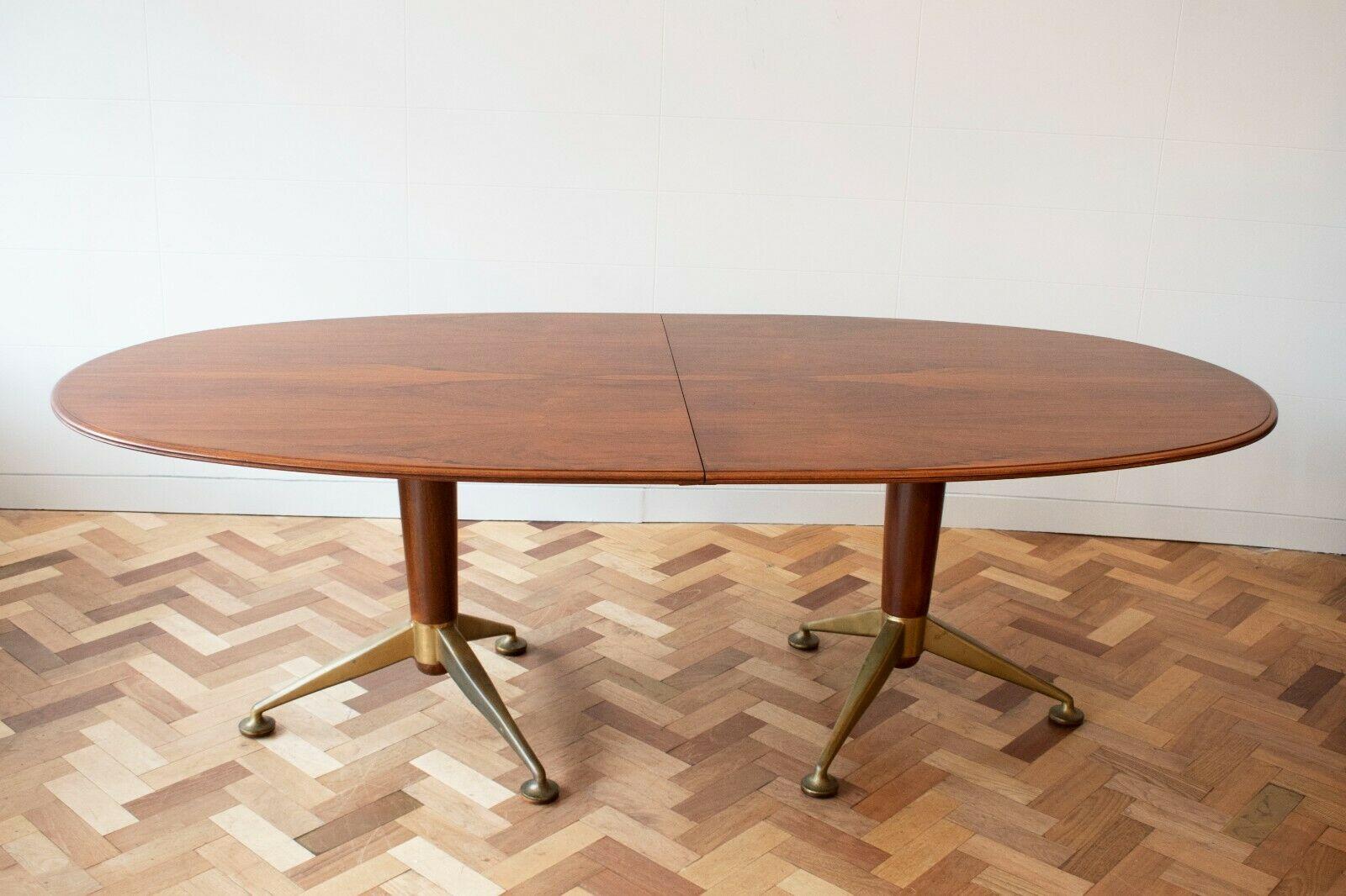 British 1950s Rosewood Dining Table with Brass Feet by Andrew J Milne for Heals London