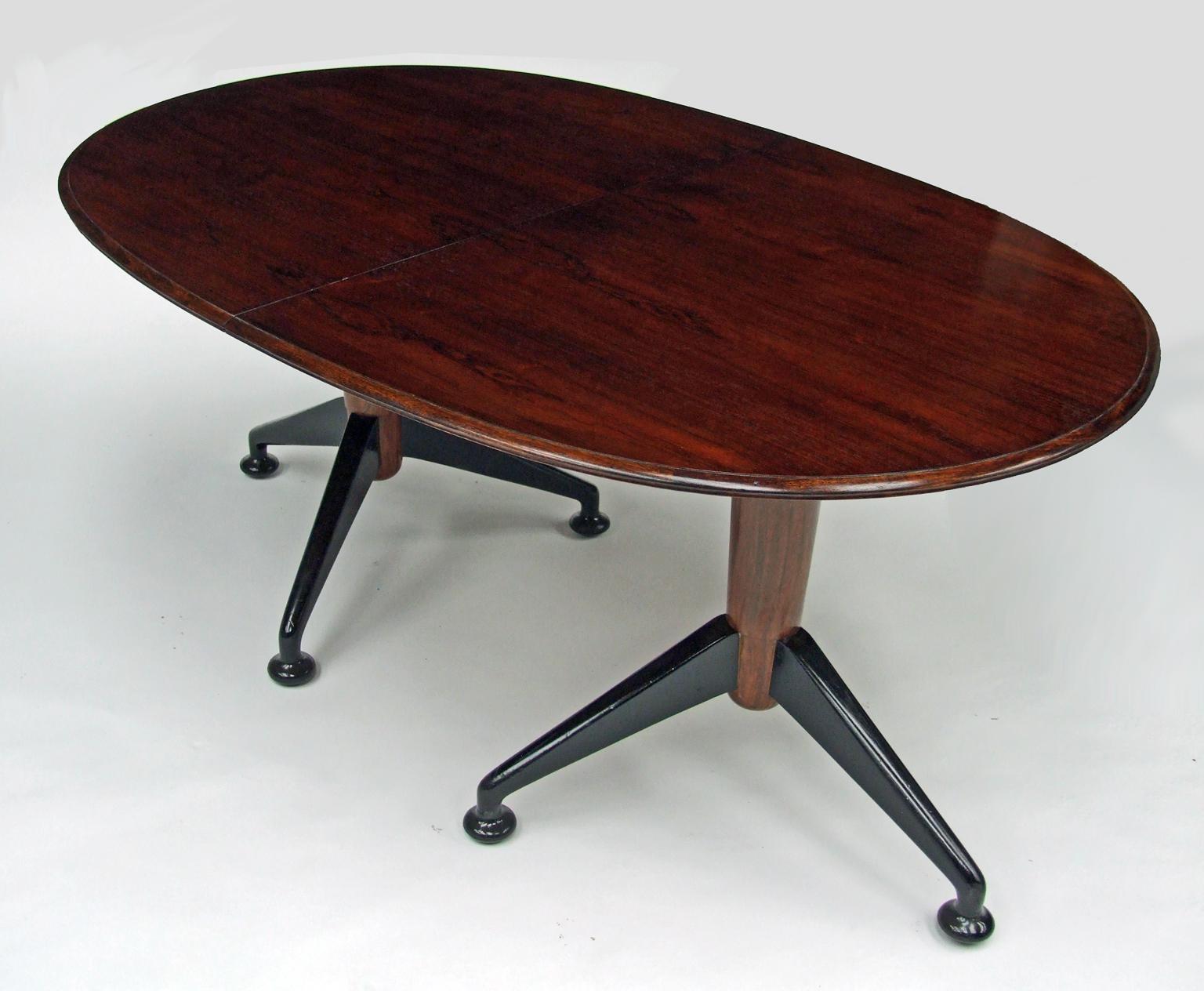 English 1950s Rosewood Extendable Oval Dining Table by A J Milne for Heals, London For Sale