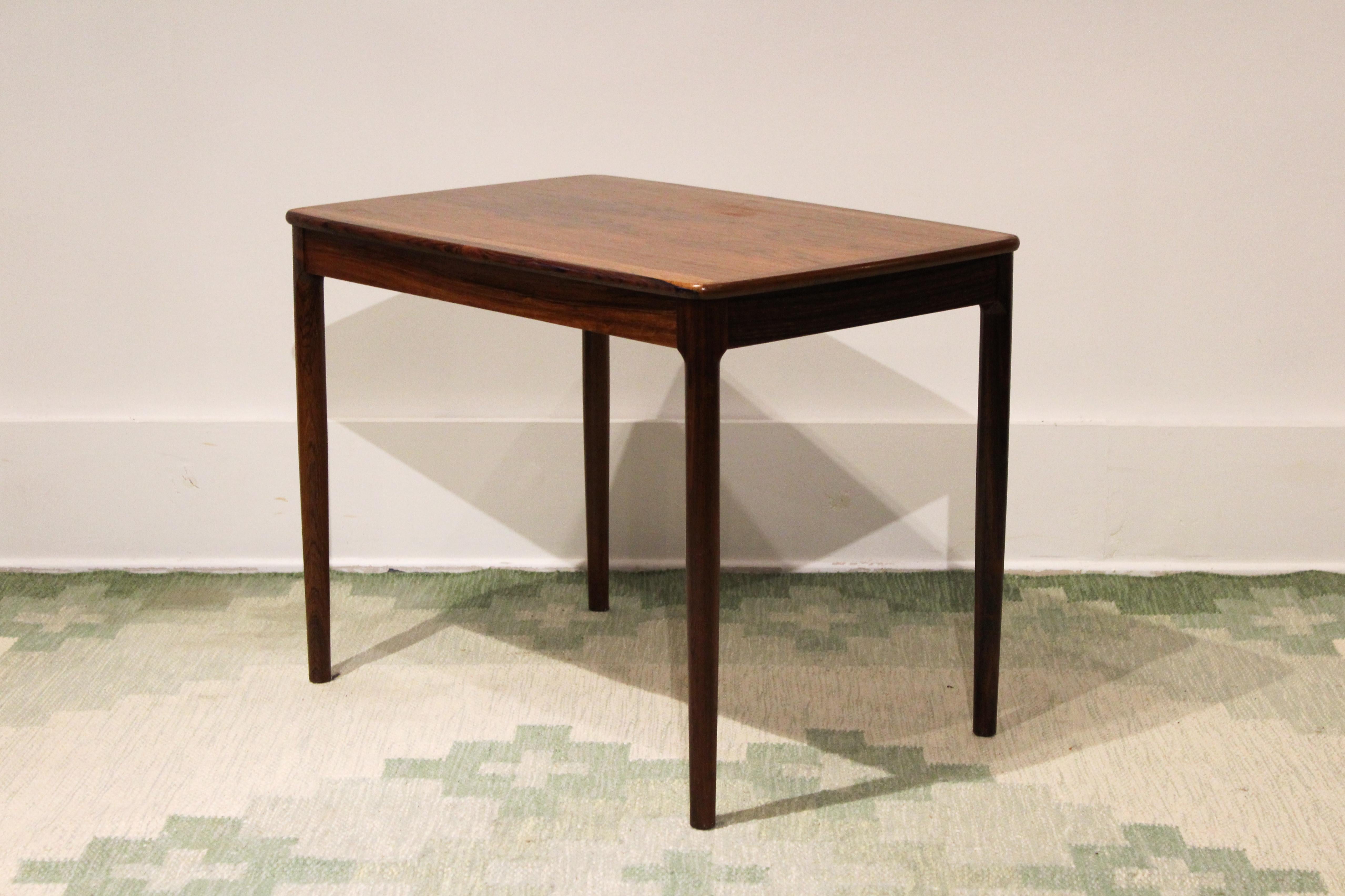A midcentury coffee or side table designed by Yngvar Sandström in the 1950s. The table is made out of rosewood and was produced by Seffle Möbelfabrik. Very good vintage condition, very small veneer dent on one of the short sides.