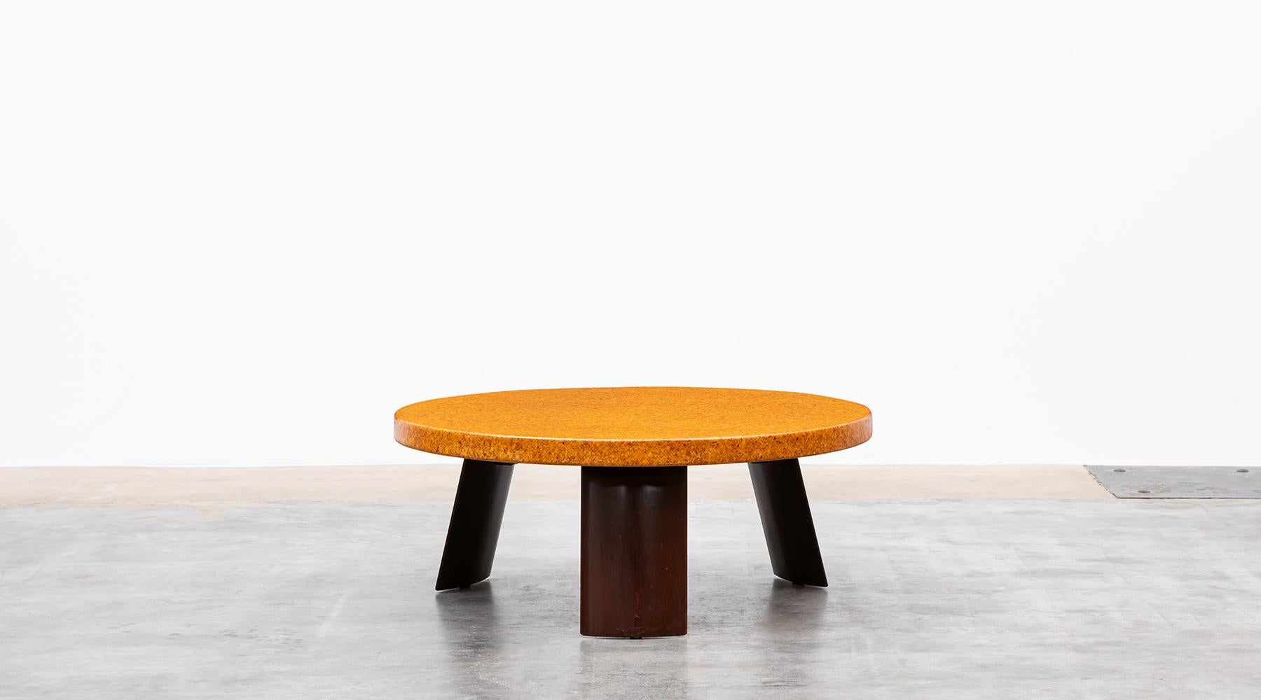 Round coffee table from the middle of the century, designed by Paul Frankl. The tabletop in cork lay on three wooden mahogany legs. This example is numbered on the underside 5018#248. Manufactured in 1951 by Johnson Furniture. 

Viennese Art Deco