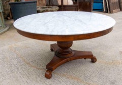1950s Round dining table with marble top and carved base