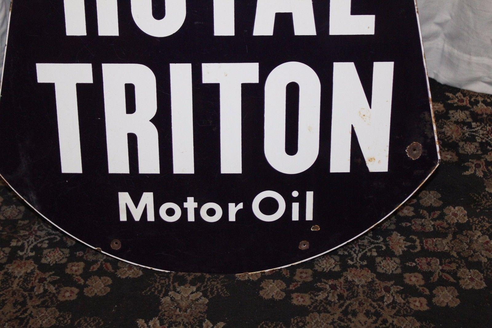 This double sided sign is made to hand in a dealership or body shop to advertise Royal Triton Motor oil.