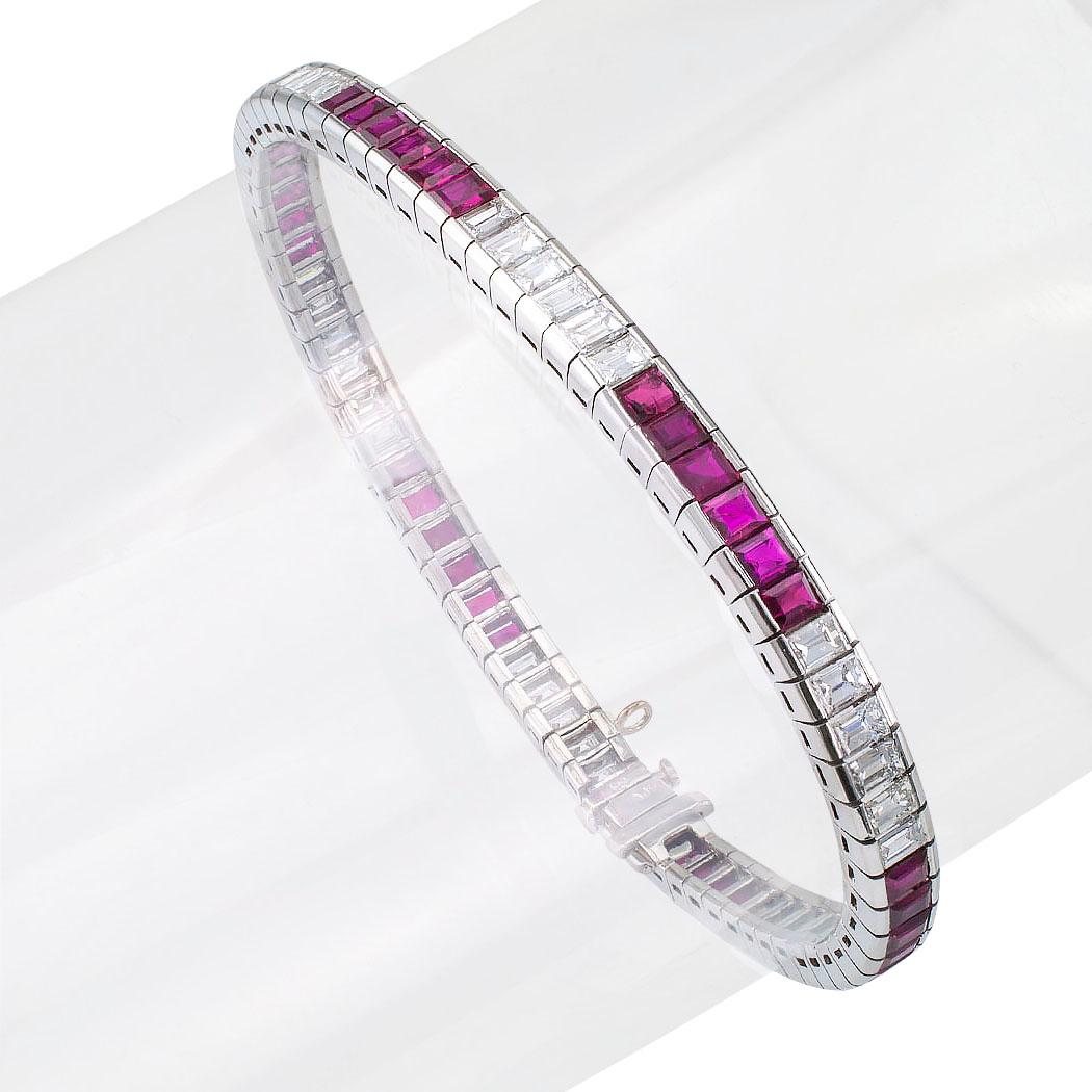 Estate diamond ruby and platinum line bracelet circa 1950. Comprising sextets of diamonds alternating with sextets of rubies, the rubies totaling approximately 6.00 carats and the diamonds weighing approximately 4.50 carats, approximately G – H
