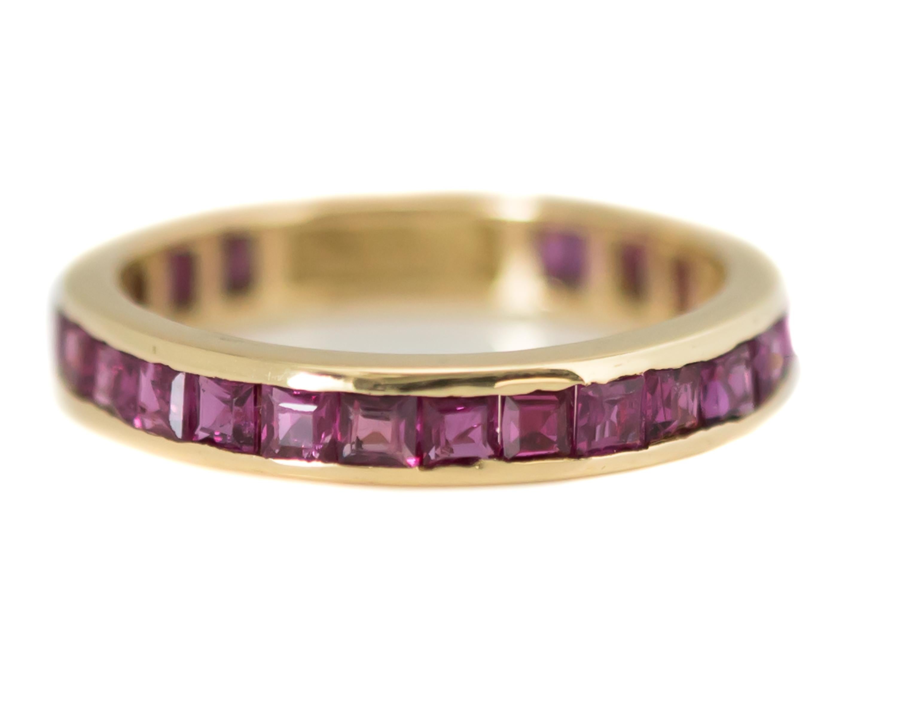 1950s Retro Ruby Eternity Band - 14 Karat Yellow Gold, Rubies

Features: 
3 millimeter wide band
Channel set, square French cut Rubies
Pinkish-red rubies
14 Karat Yellow Gold High Polish Setting
Ring fits a size 4.75

Ring Details;
Size: 4.75
Width: