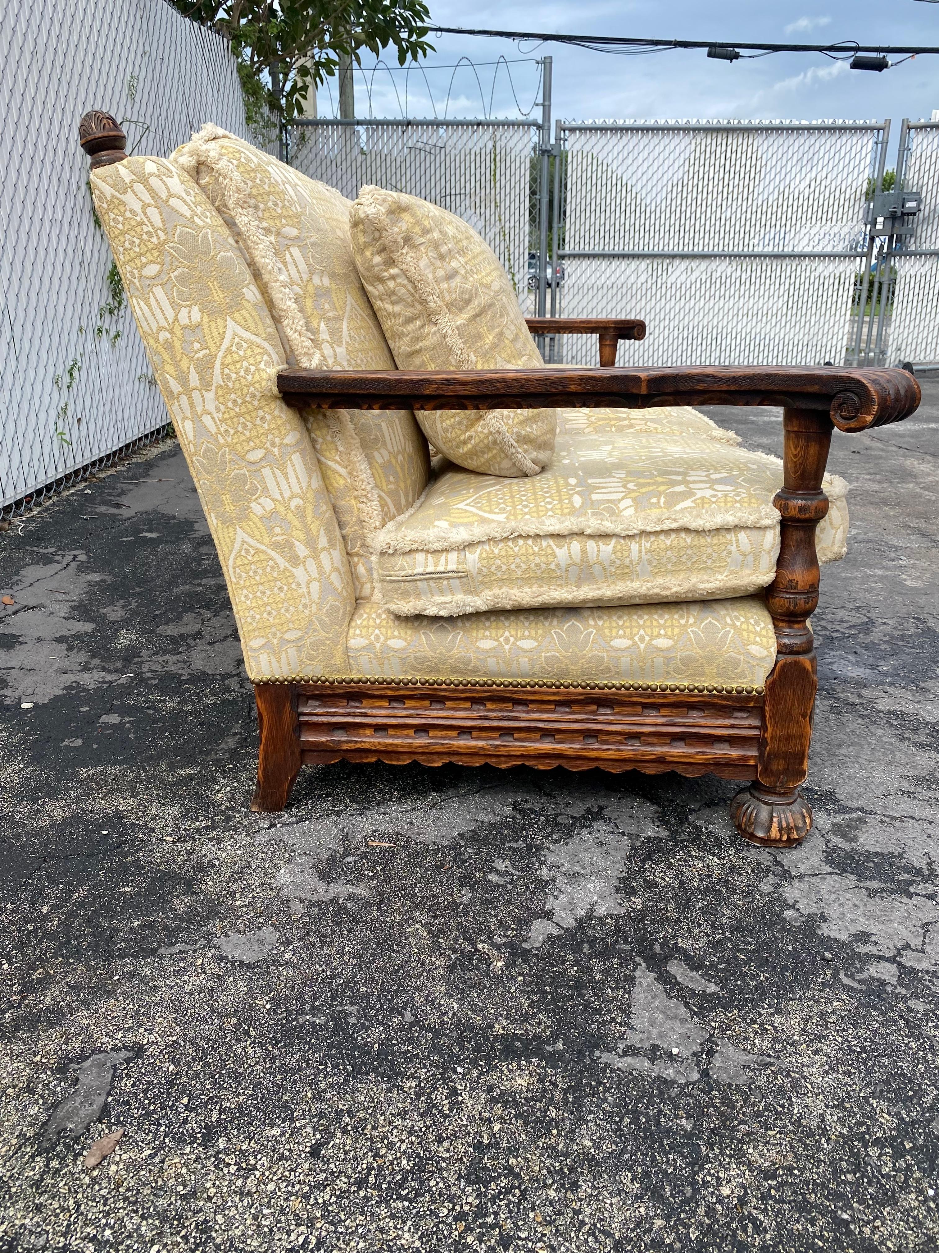 American 1950s Rustic Hand Carved Wood Fringe Sofa  For Sale