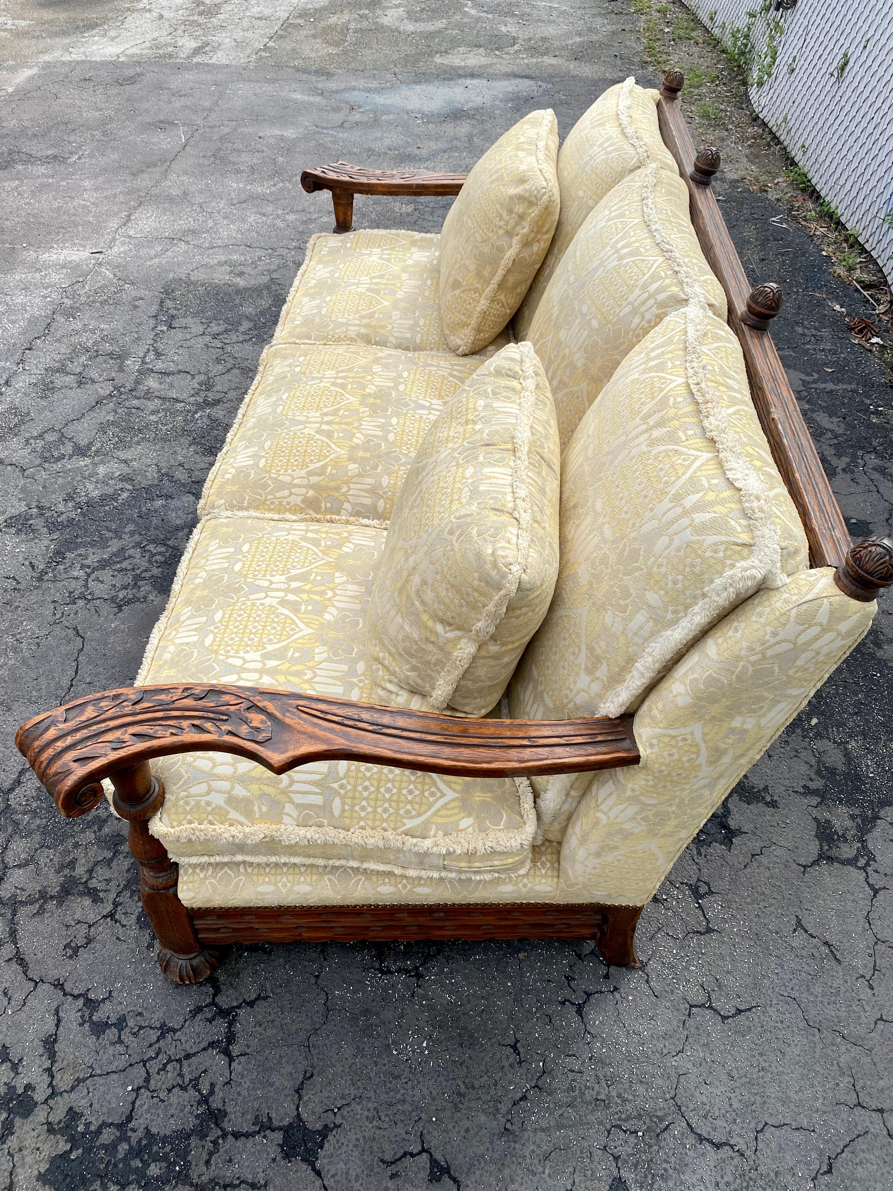 1950s Rustic Hand Carved Wood Fringe Sofa  In Good Condition For Sale In Fort Lauderdale, FL
