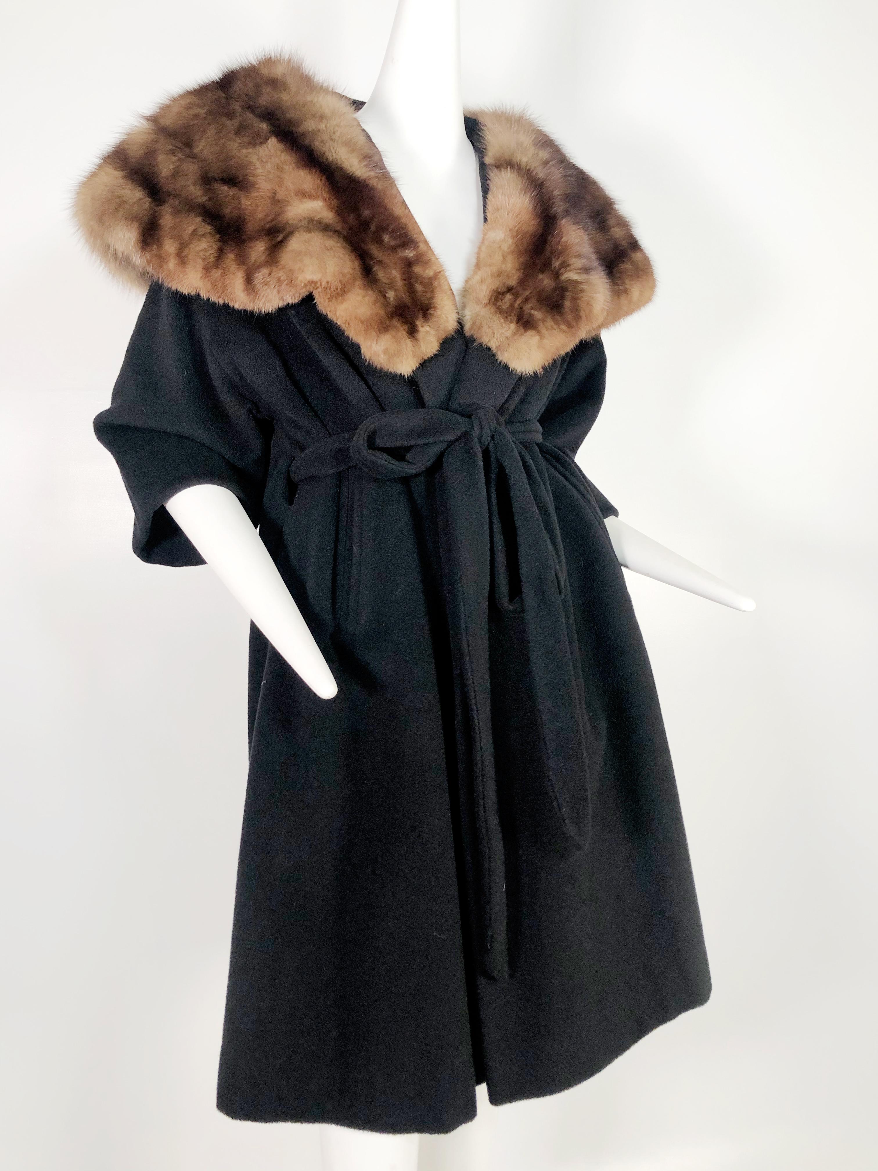 A gorgeous late 1950s Saks Fifth Avenue black cashmere kimono-esque, half-belted coat with 3/4 sleeves and a huge, luxurious sable collar.  Fully Lined. Made by Forstmann.