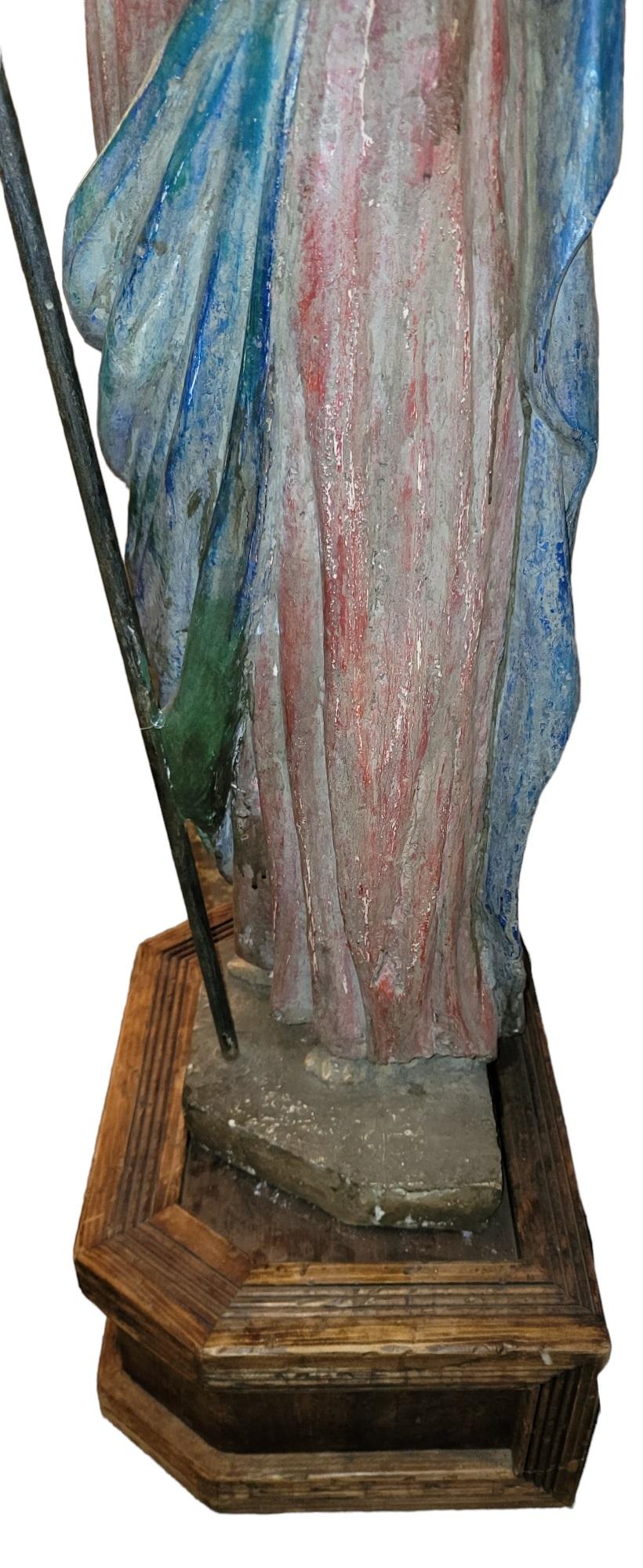 Italian Wood porcelain and metal hand made in original paint Antique Santo Baptiste Sculpture w/stand 65 high x 17 deep x 20 wide 

Jean Baptiste with custom made stand. The left hand/arm of this statue hold a staff. St. Jean was he cousin of