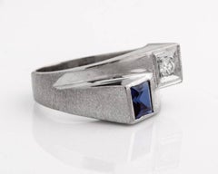 1950s Sapphire and Diamond 14 Karat White Gold Bypass Ring