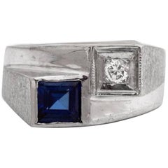 Vintage 1950s Sapphire and Diamond 14 Karat White Gold Bypass Ring