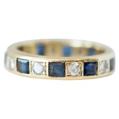 Vintage 1950s Sapphire and Diamond 14 Karat Yellow Gold Eternity Band