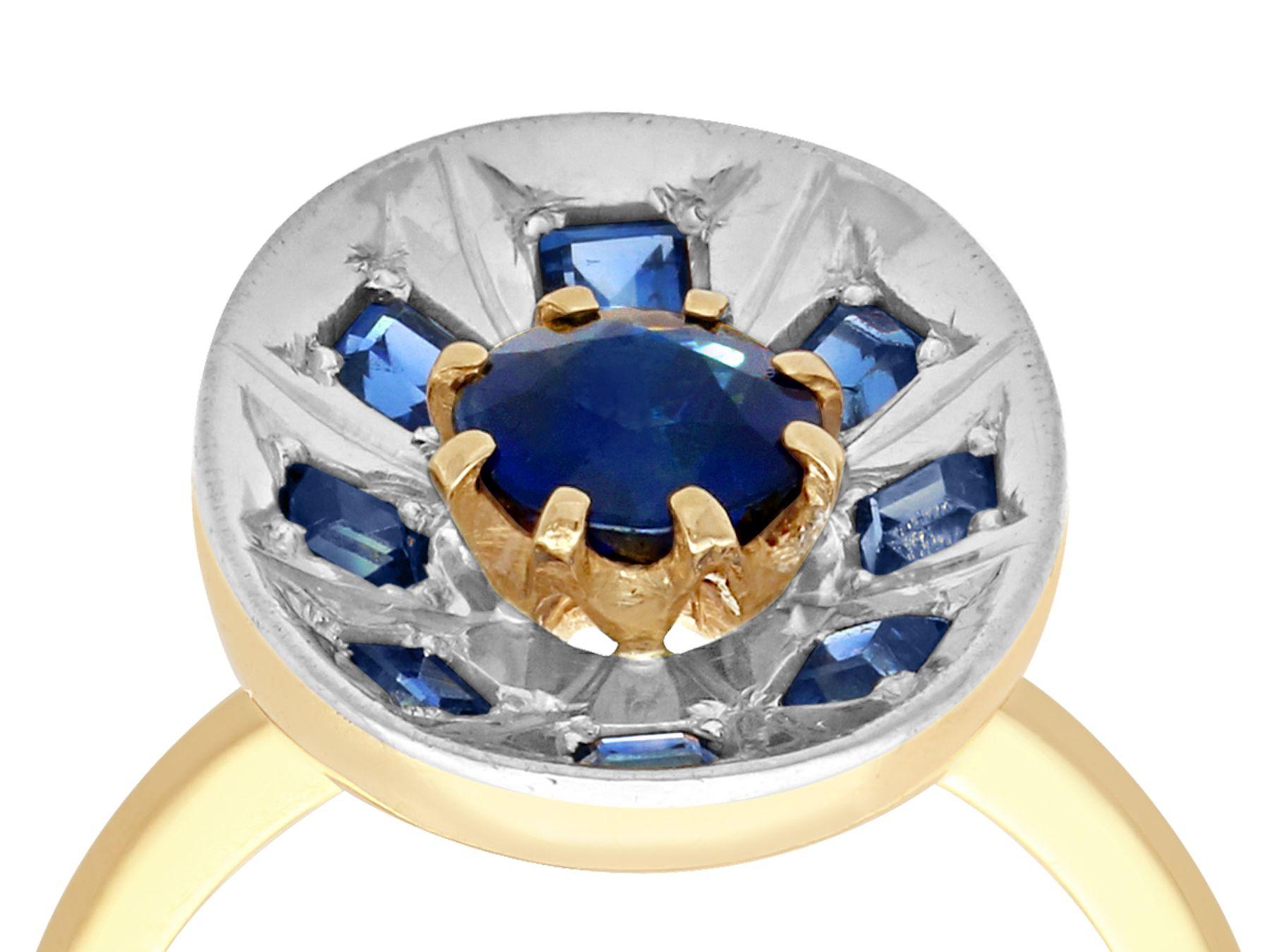 An unusual, fine and impressive vintage 0.85 carat natural blue sapphire, 18 karat yellow gold retro ring; part of our vintage jewelry and estate jewelry collection.

This unusual, impressive 1950s sapphire ring has been crafted in 18k yellow