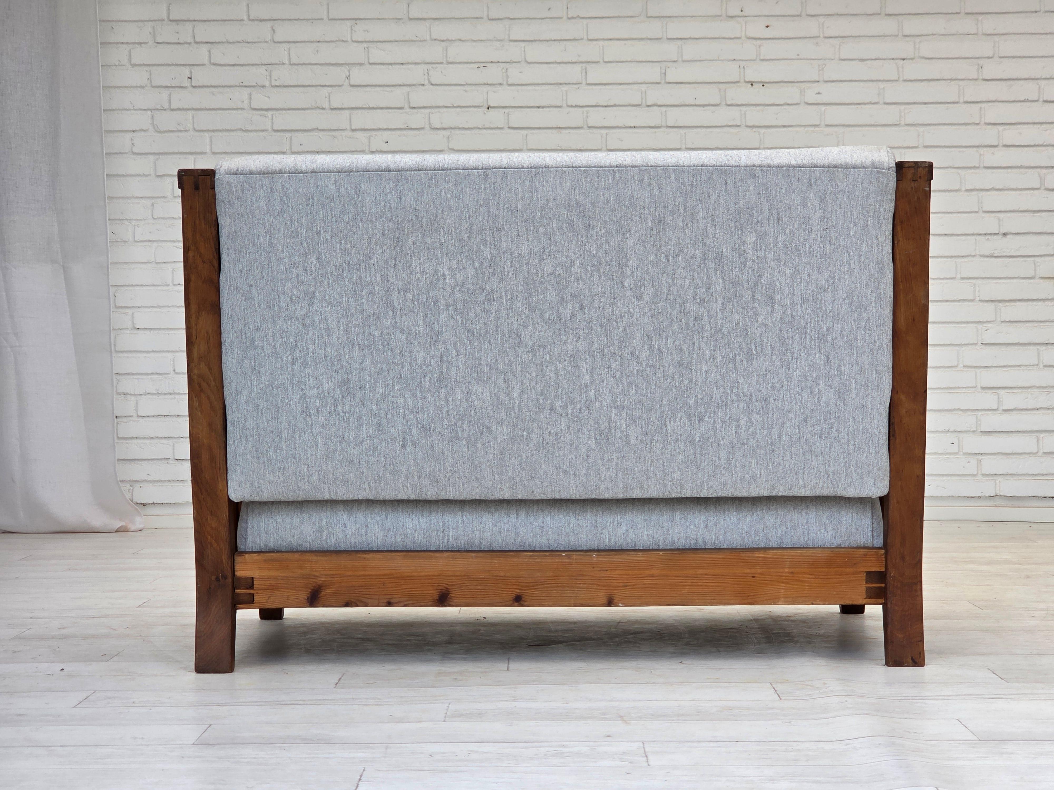 1950s, Scandinavian 2-seater sofa, reupholstered, furniture wool, oak. In Good Condition For Sale In Tarm, 82